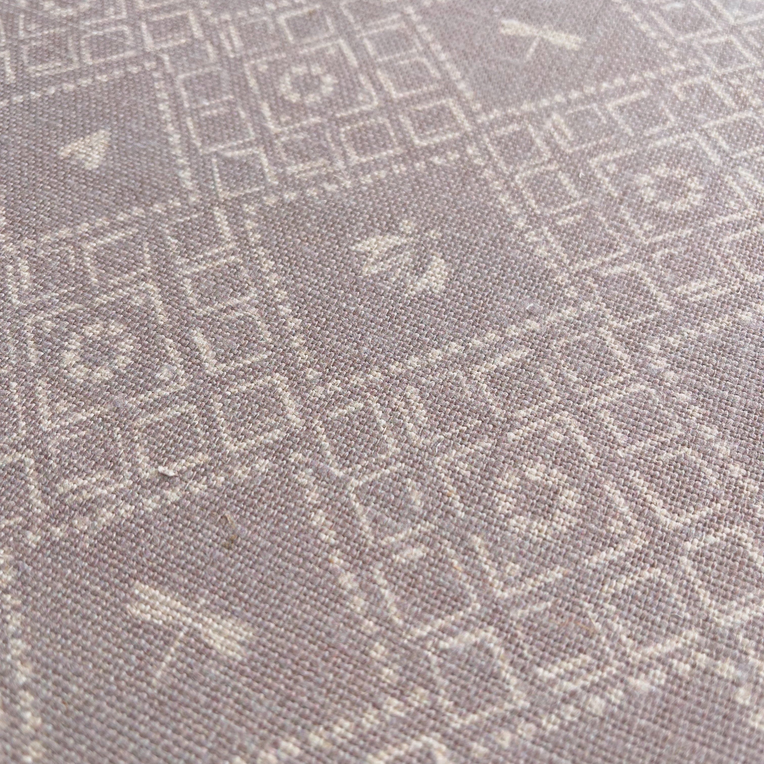 Americana pillow in Camomile β close-up of natural linen and pattern from the Fauna Collection