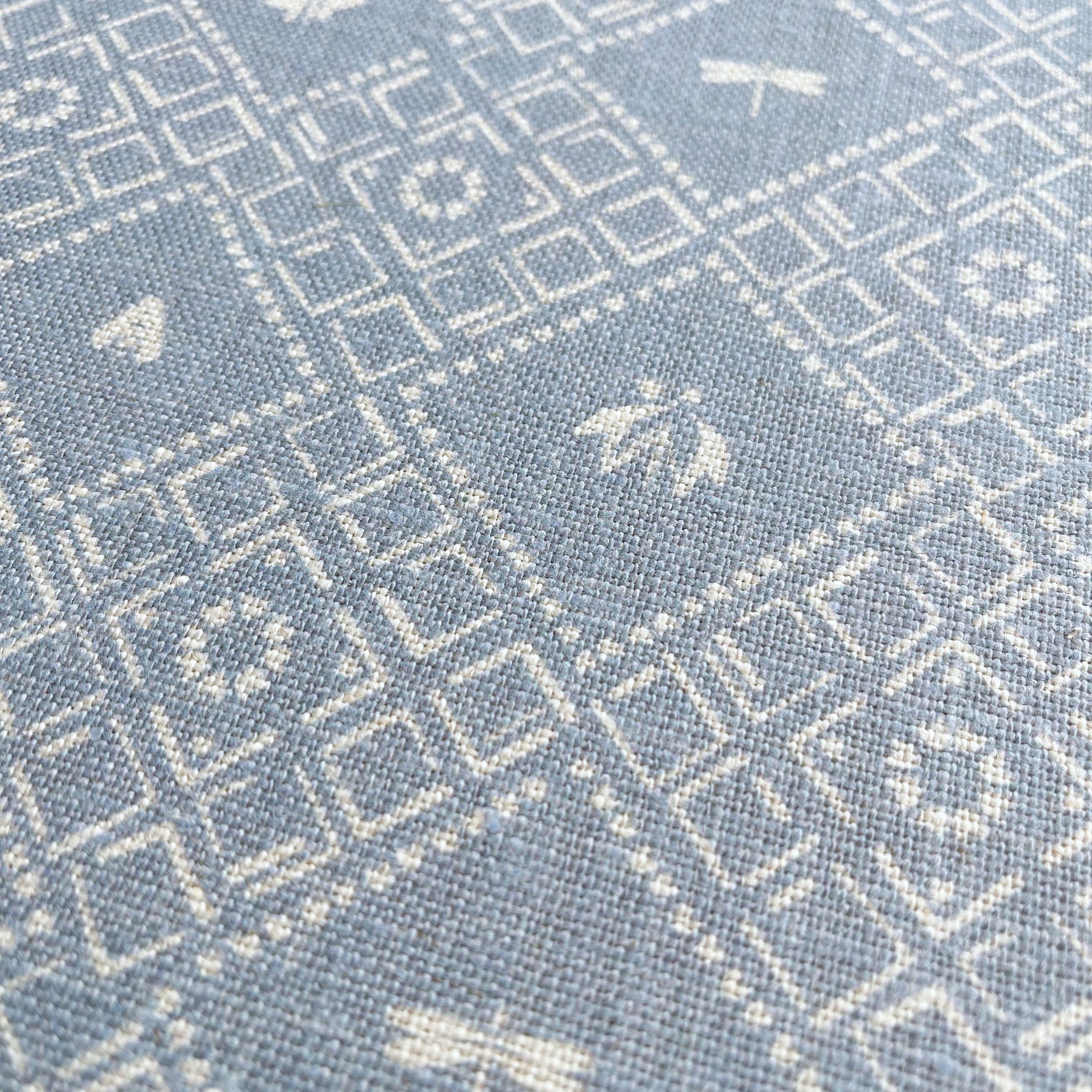 Americana pillow in Cornflower – close-up of natural linen and pattern from the Fauna Collection