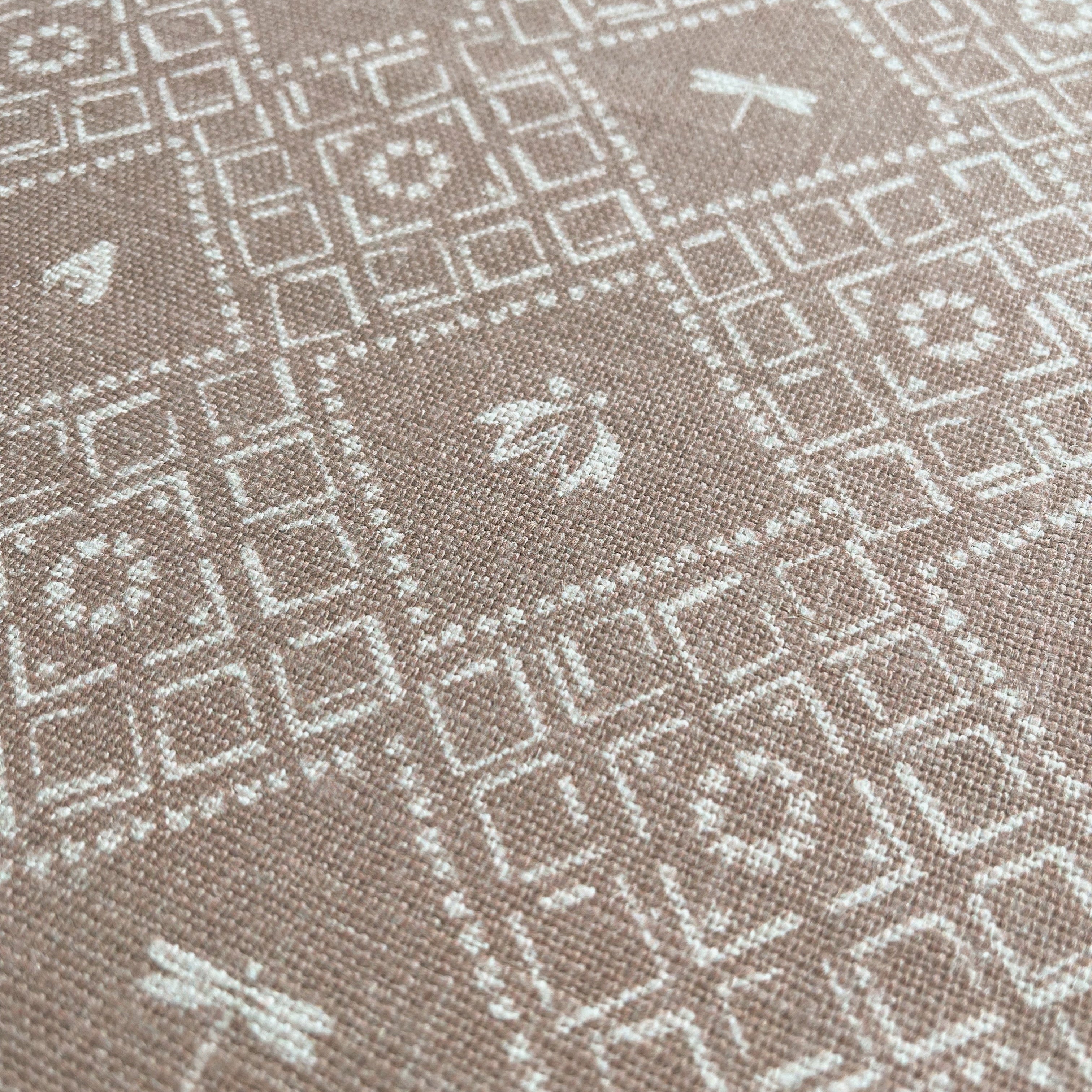 Americana pillow in Cumin β close-up of natural linen and pattern from the Fauna Collection
