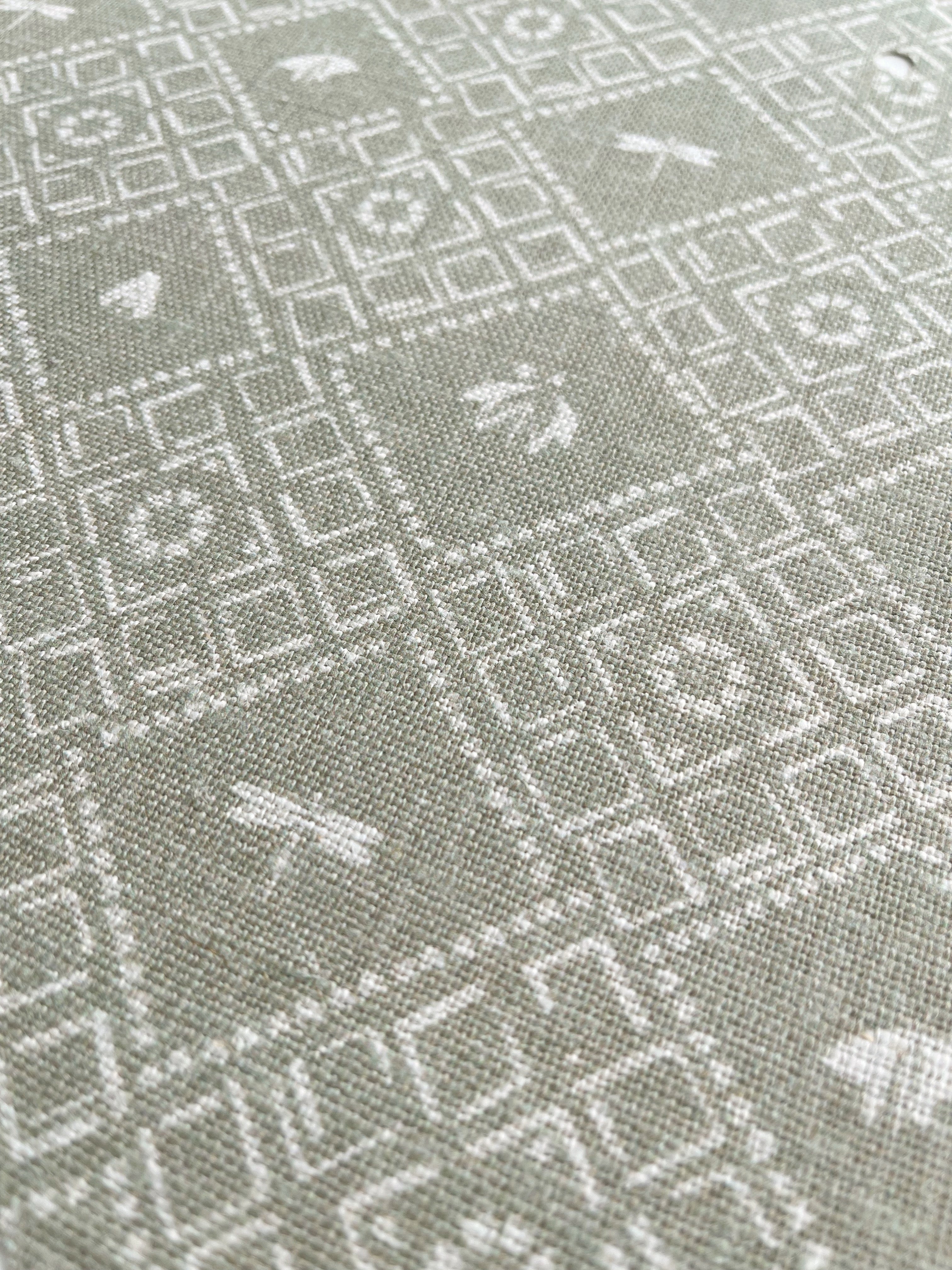 Americana pillow in Edamame – close-up of natural linen and pattern from the Fauna Collection