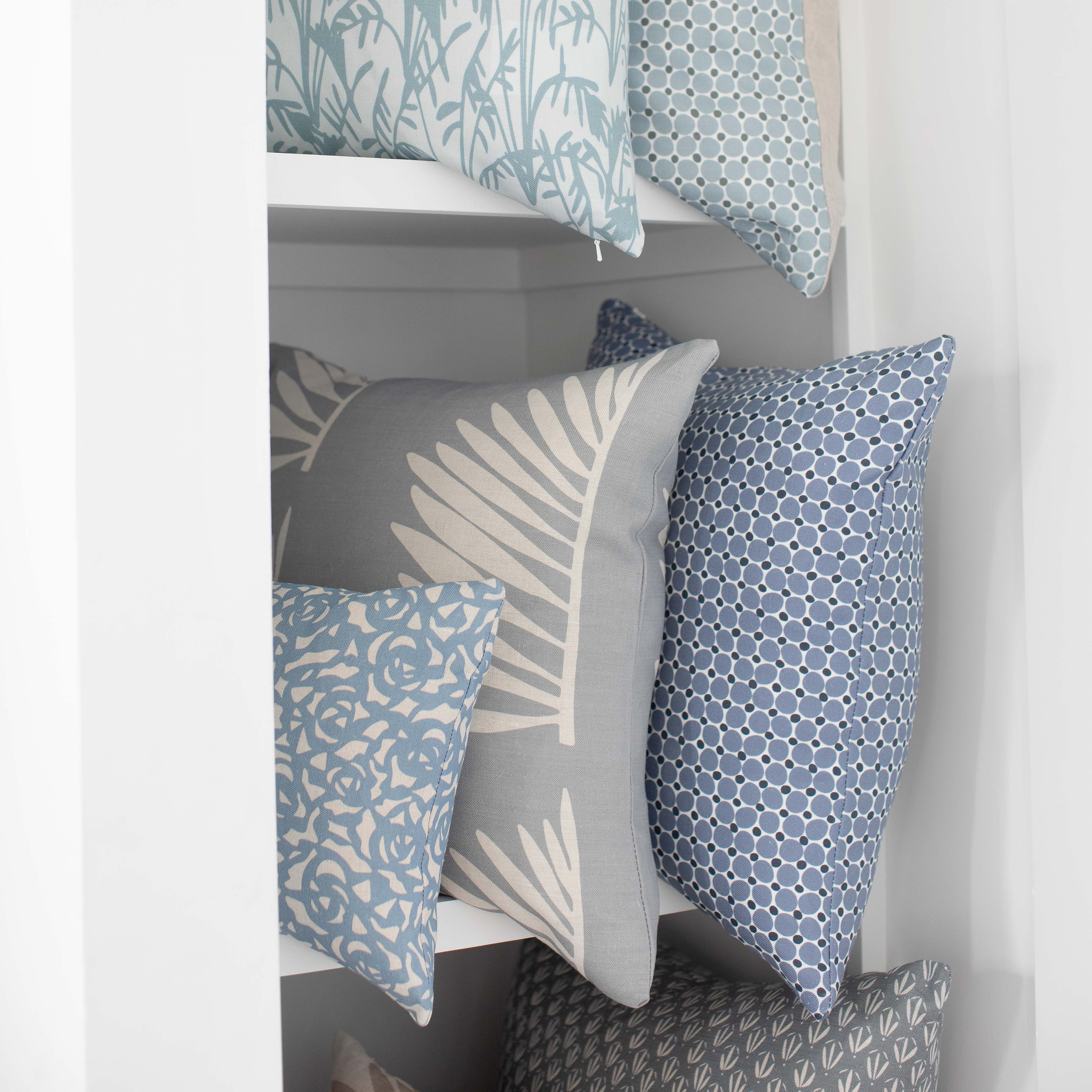 Cobblestone pillow in Ink styled by Emily Daws – mixed with other patterns in a classic Southern bedroom