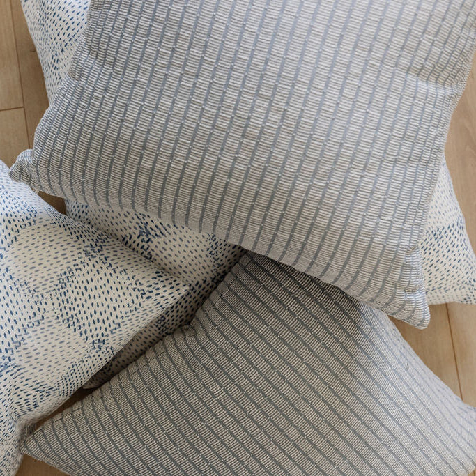 Jetty Dolphin pillows by Emily Daws Textiles, woven Belgian linen in a coastal blue-gray tone. Small batch fabric for upholstery, drapery, and pillows.