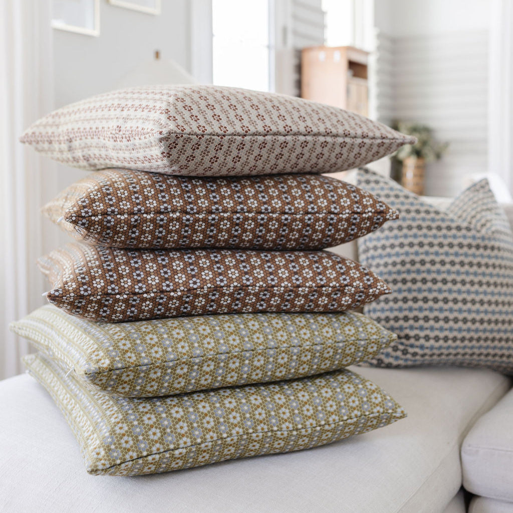 Stack of Emily Daws Nectar pillows, small batch woven fabrics for interior designers and bespoke timeless interiors.