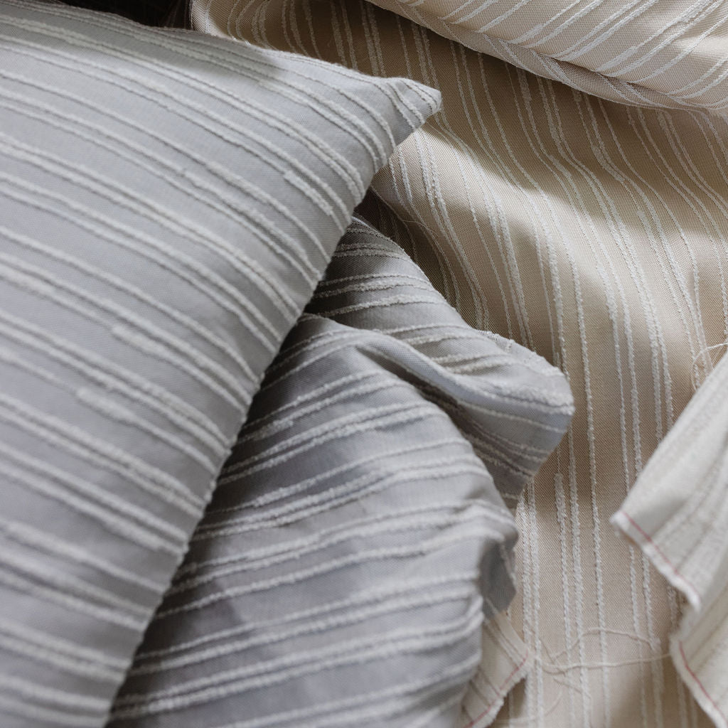 Emily Daws luxury woven pillows in Washout Pebble, boutique fabric and pillows for bespoke interiors and high-end design projects.