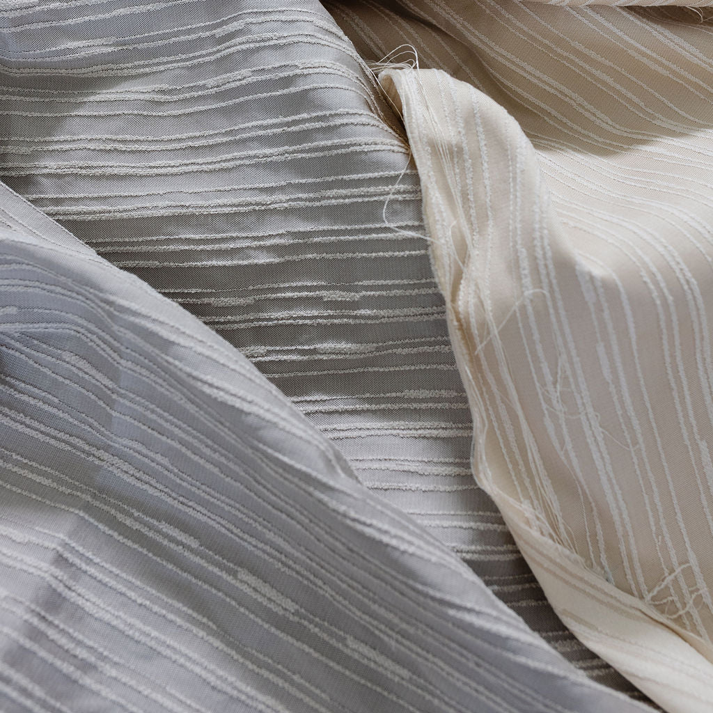 Emily Daws luxury woven fabric Washout in Pebble, boutique textiles for interiors, ideal for custom pillows, upholstery, and window treatments.