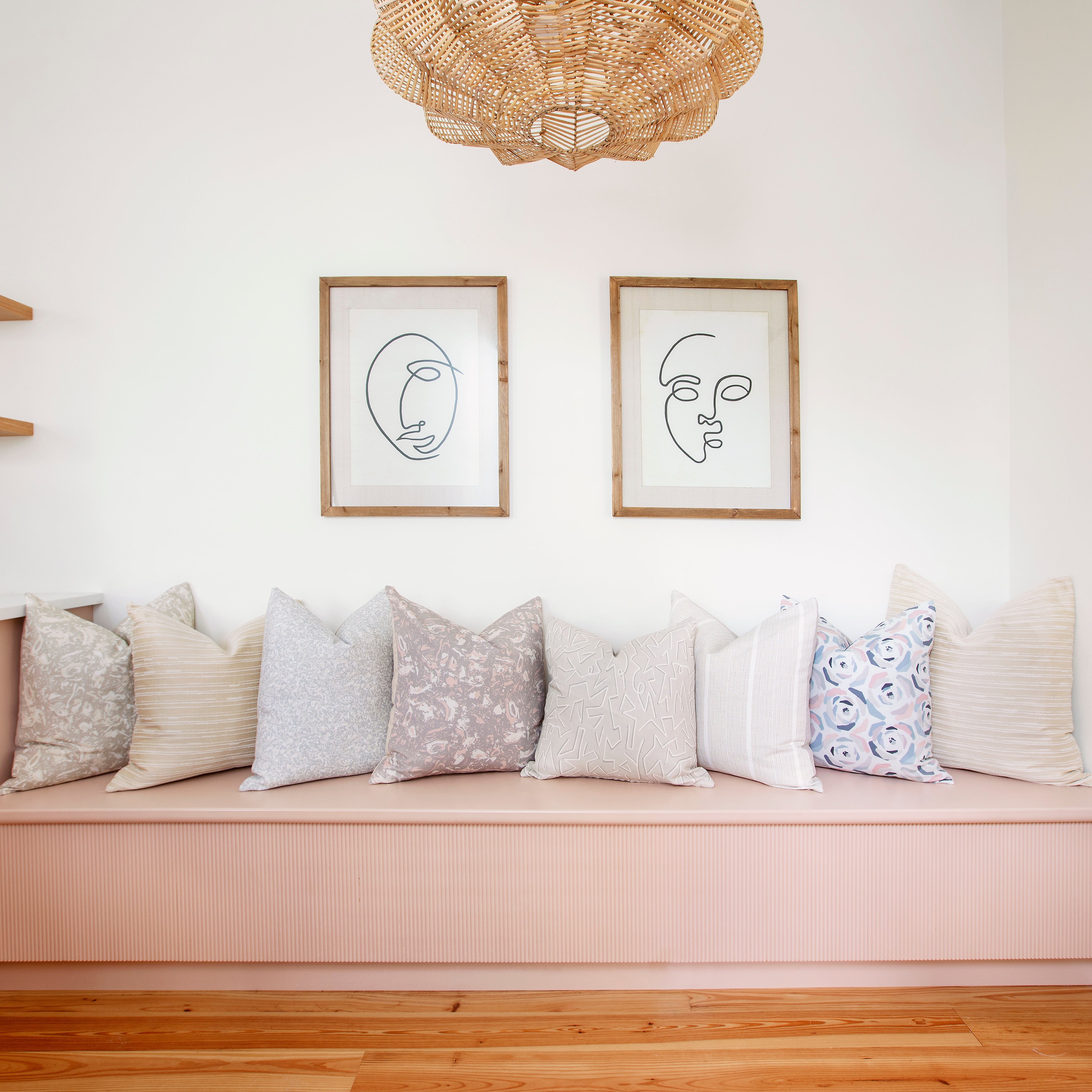 Bench seating styled with Emily Daws pillows in Belgian linen fabrics, created for trade professionals and clients.