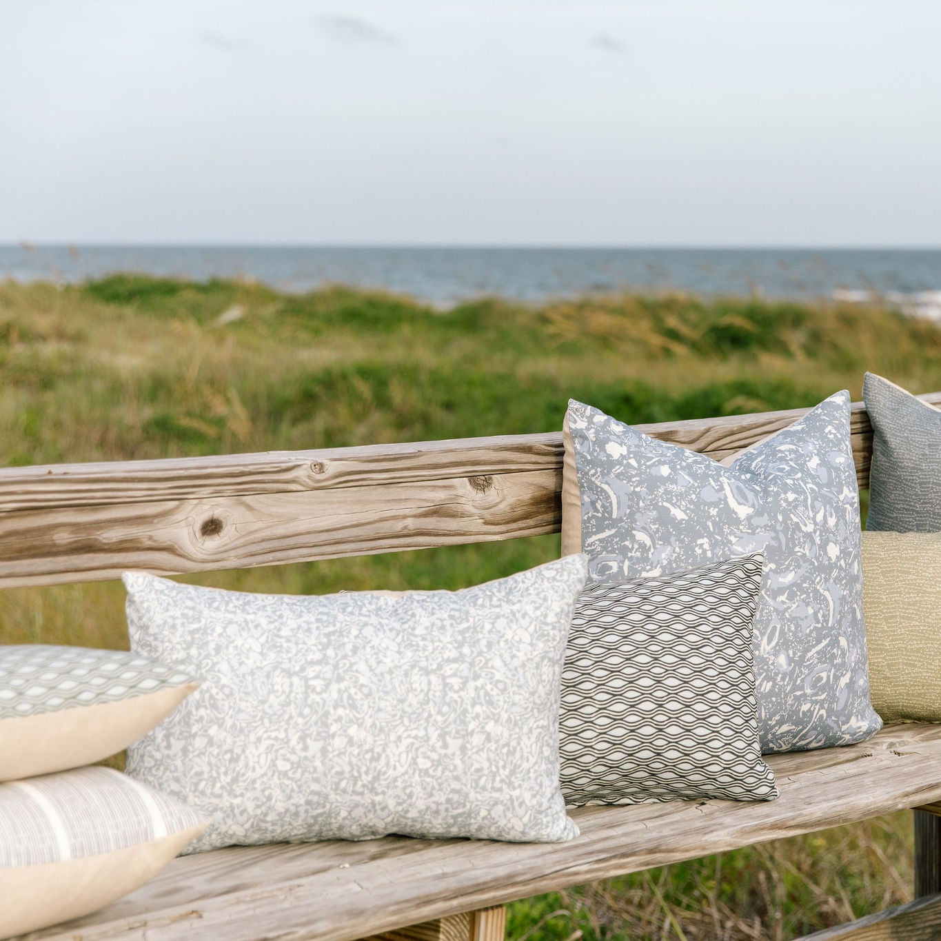 Decorative pillow grouping by Emily Daws featuring small-batch fabrics and Southern-inspired design details.