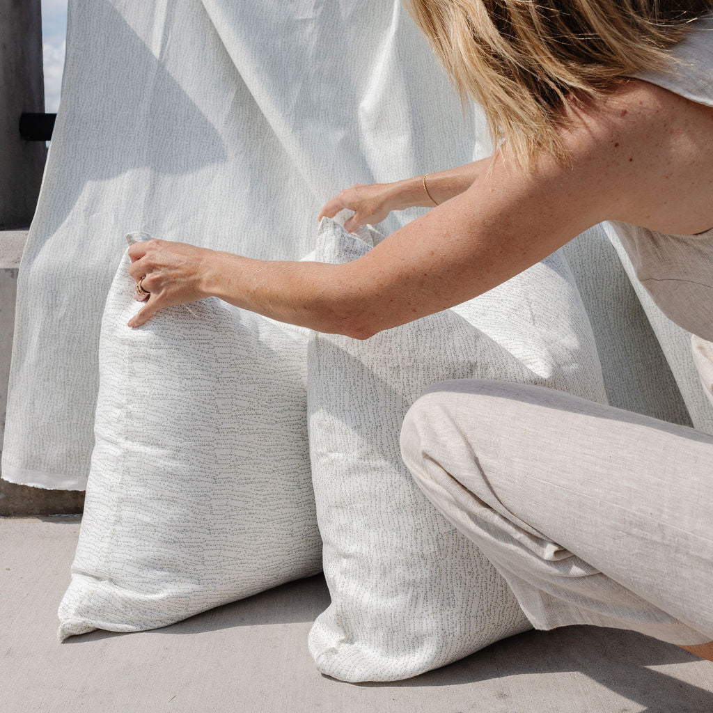 Decorative pillow grouping by Emily Daws featuring small-batch fabrics and Southern-inspired design details.