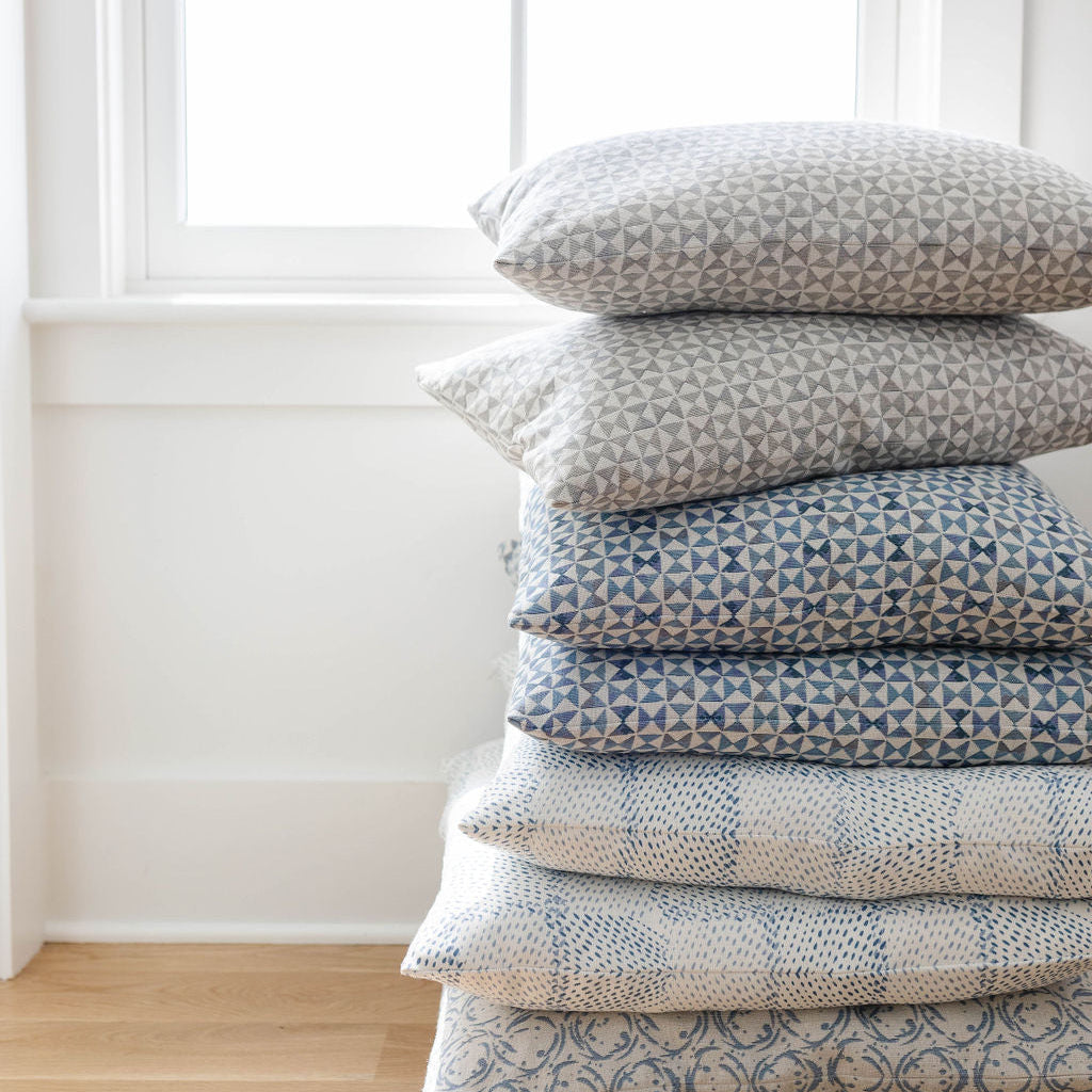 Custom linen fabric by Emily Daws, suitable for window treatments, pillows, and wallcoverings in boutique interiors.