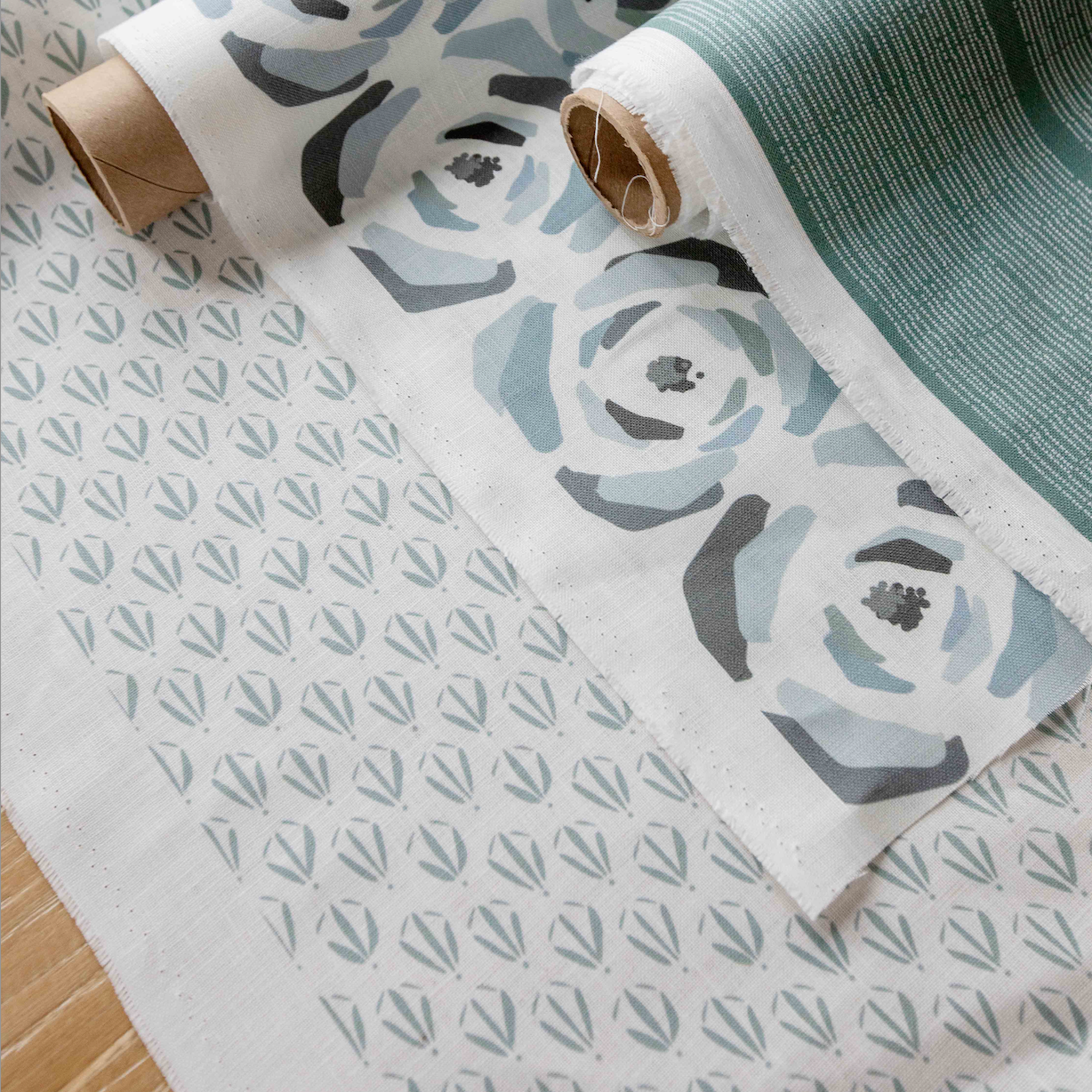 Custom linen fabric by Emily Daws, suitable for window treatments, pillows, and wallcoverings in boutique interiors.