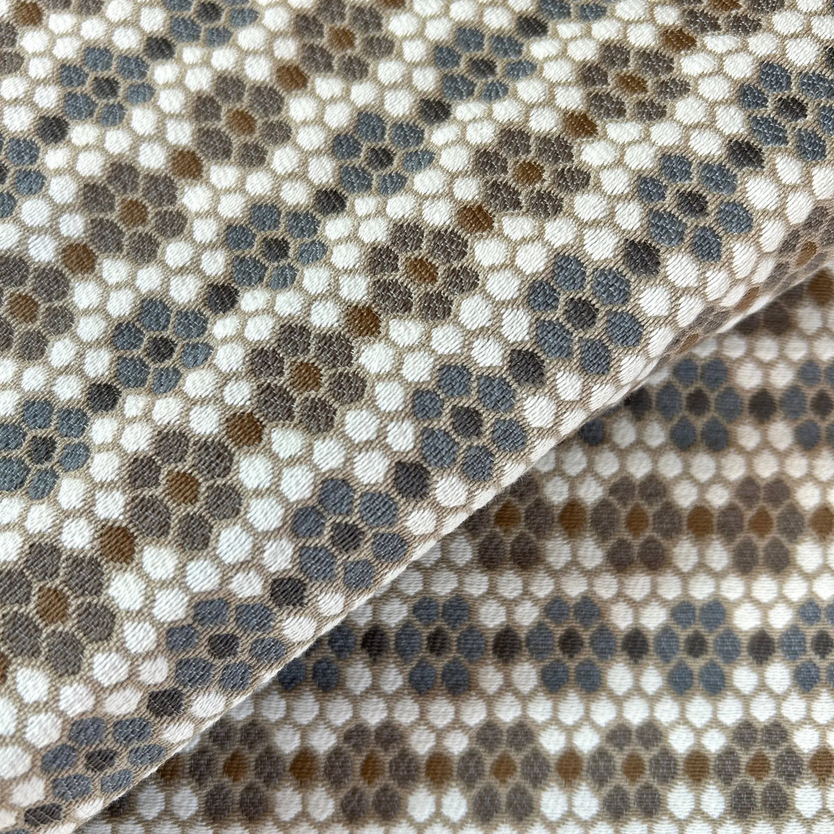 Nectar fabric in Raisin by Emily Daws — close-up detail of woven upholstery fabric, Fauna Collection