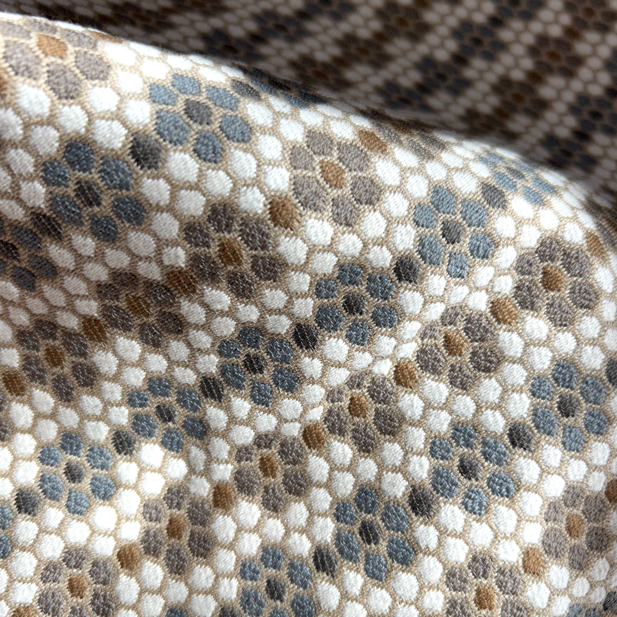 Small-batch fabric by Emily Daws crafted for designers seeking boutique textiles, pillows, and wallcoverings for refined homes.