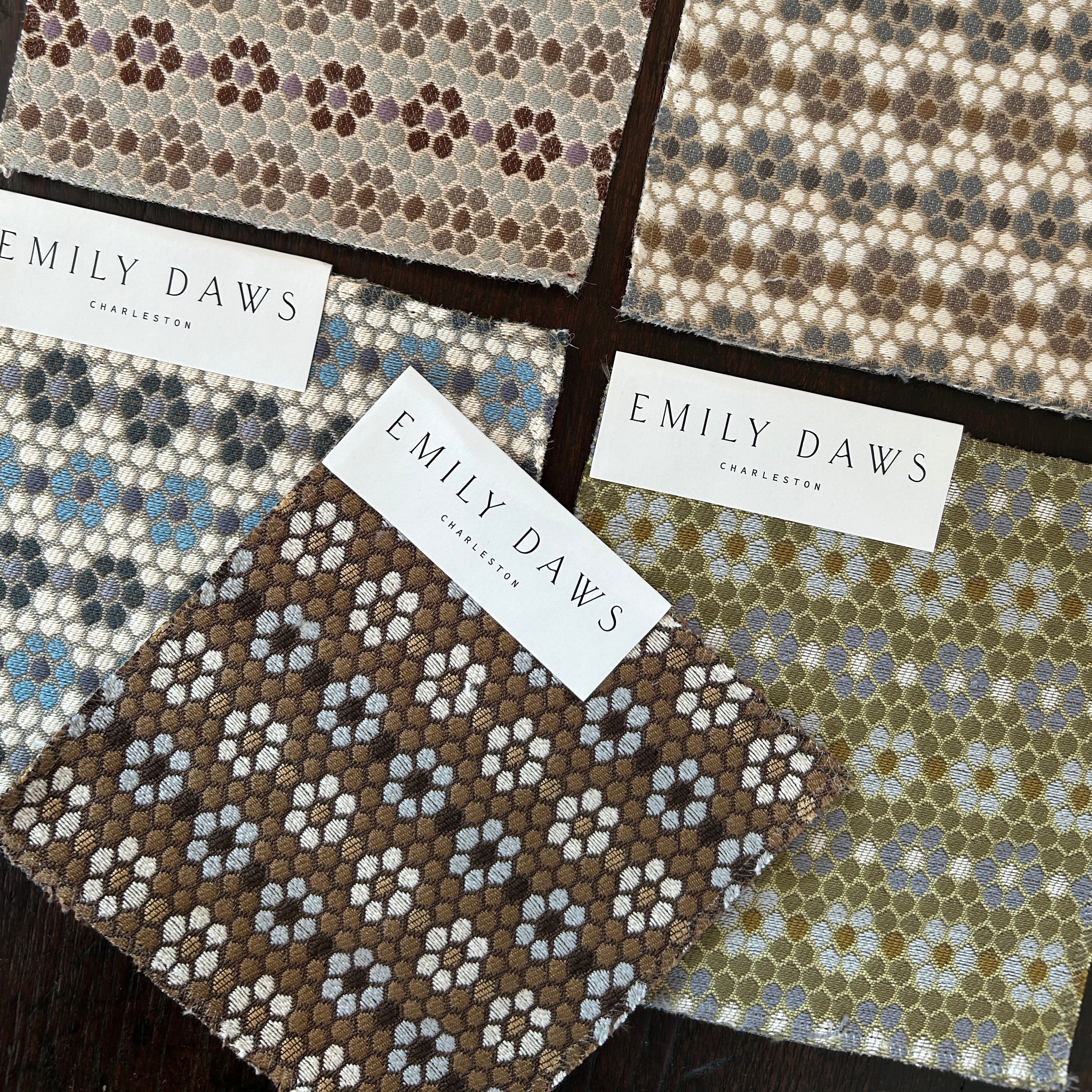 Small-batch textiles by Emily Daws suited for interior designers seeking curated fabrics, pillows, and wallcoverings.