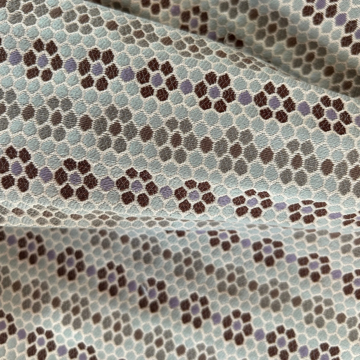 Nectar fabric in Sugar Plum by Emily Daws — close-up detail of woven upholstery fabric, Fauna Collection