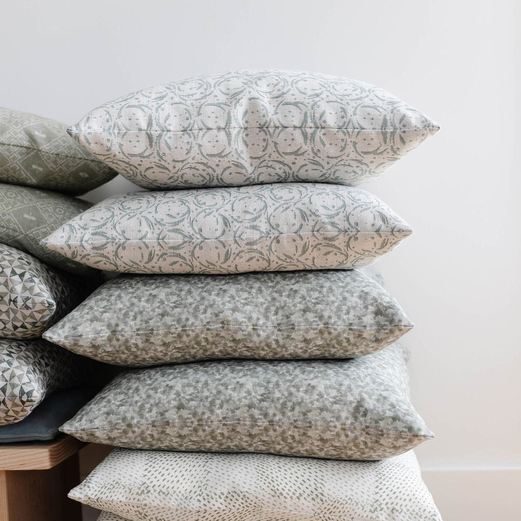 Decorative pillow grouping by Emily Daws featuring small-batch fabrics and Southern-inspired design details.