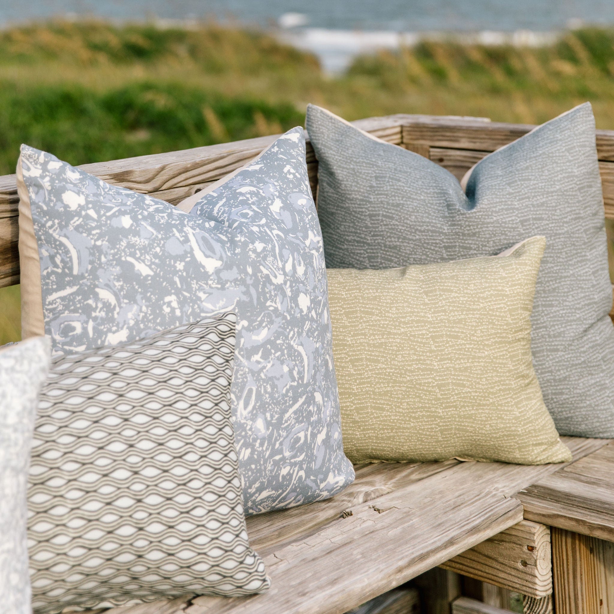 Decorative pillow grouping by Emily Daws featuring small-batch fabrics and Southern-inspired design details.