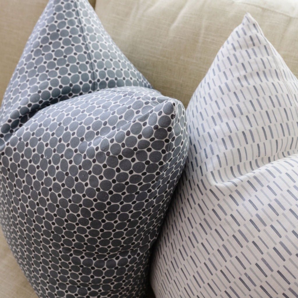 Decorative pillow grouping by Emily Daws featuring small-batch fabrics and Southern-inspired design details.