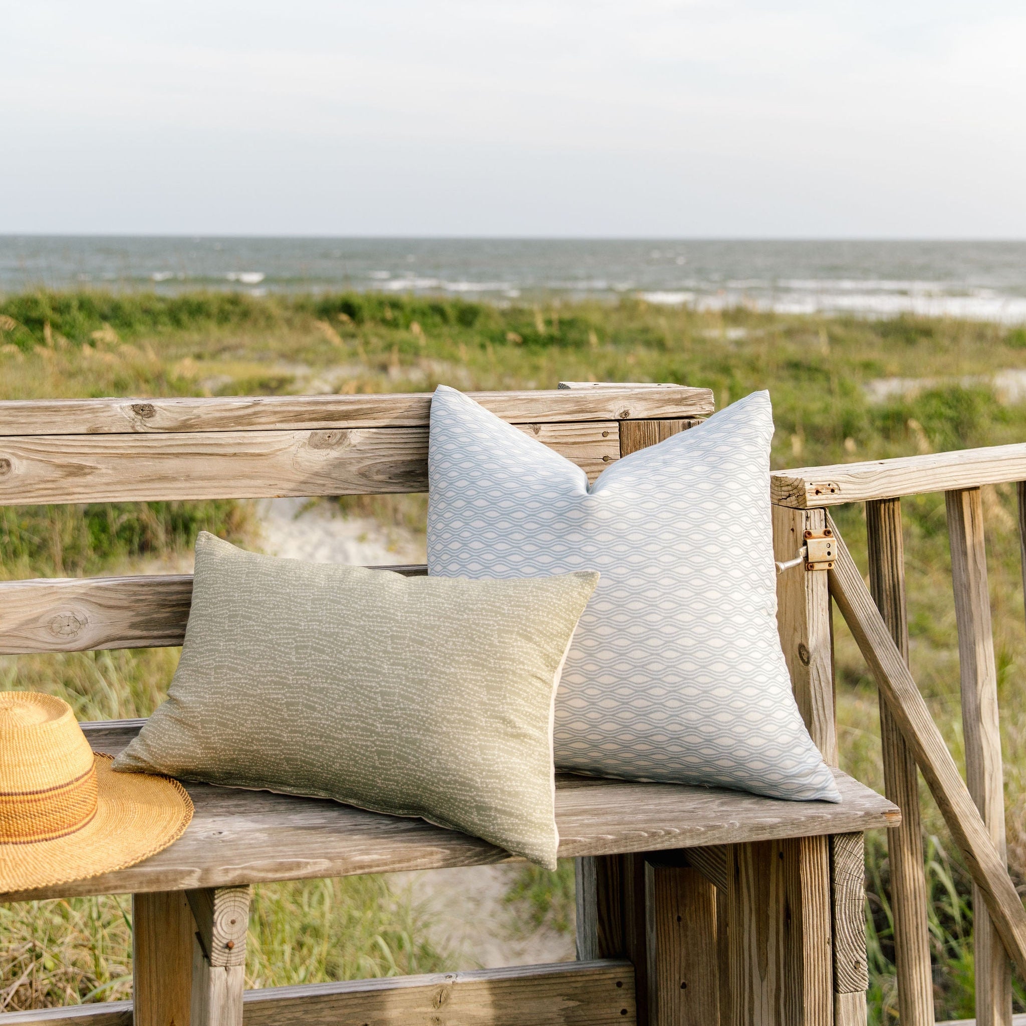 Bench seating styled with Emily Daws pillows in Belgian linen fabrics, created for trade professionals and clients.