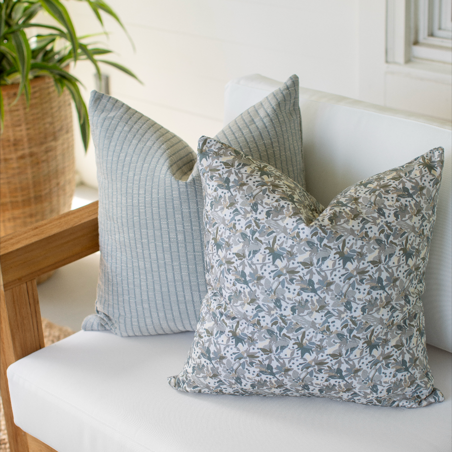 Bench seating styled with Emily Daws pillows in Belgian linen fabrics, created for trade professionals and clients.