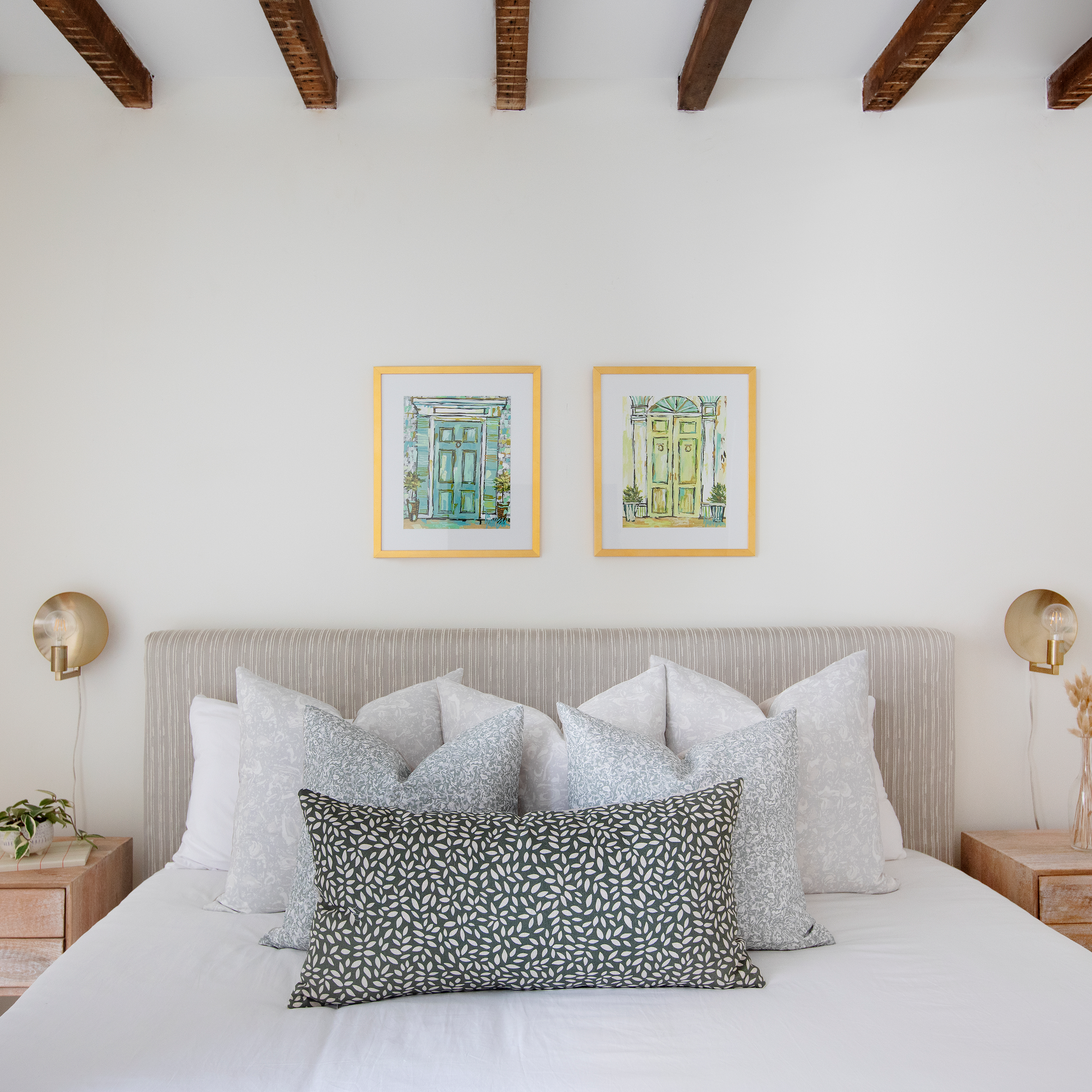 Estuary pillow in Artichoke styled by Emily Daws – shown on a porch bench with other woven accents