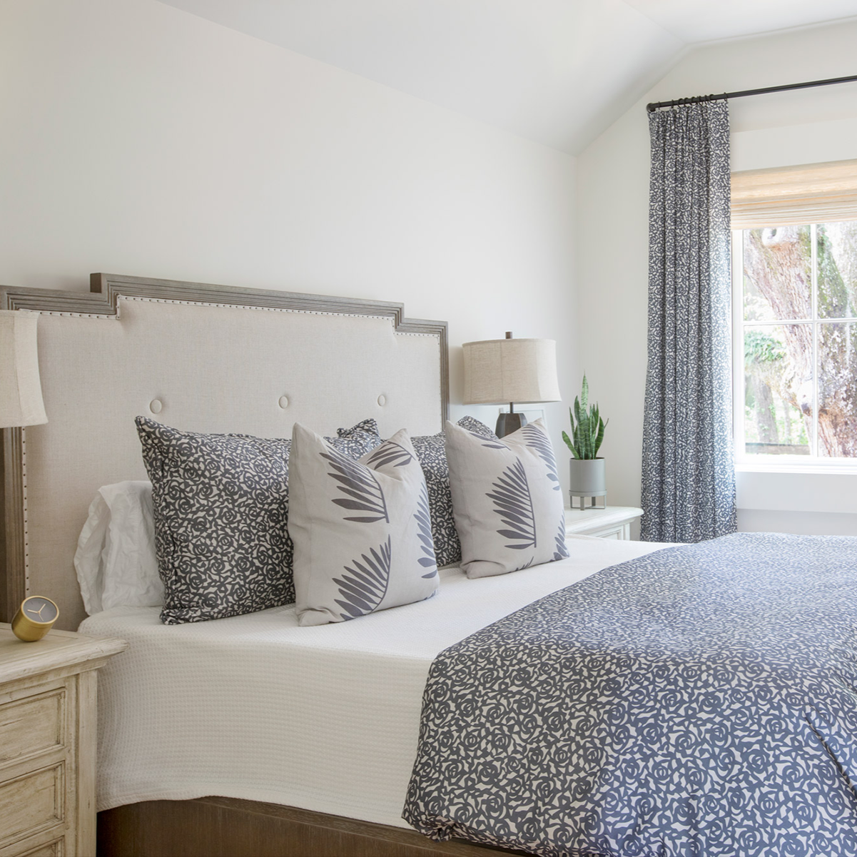 Gardenia pillow styled by Emily Daws – placed on a vintage settee in a Charleston cottage