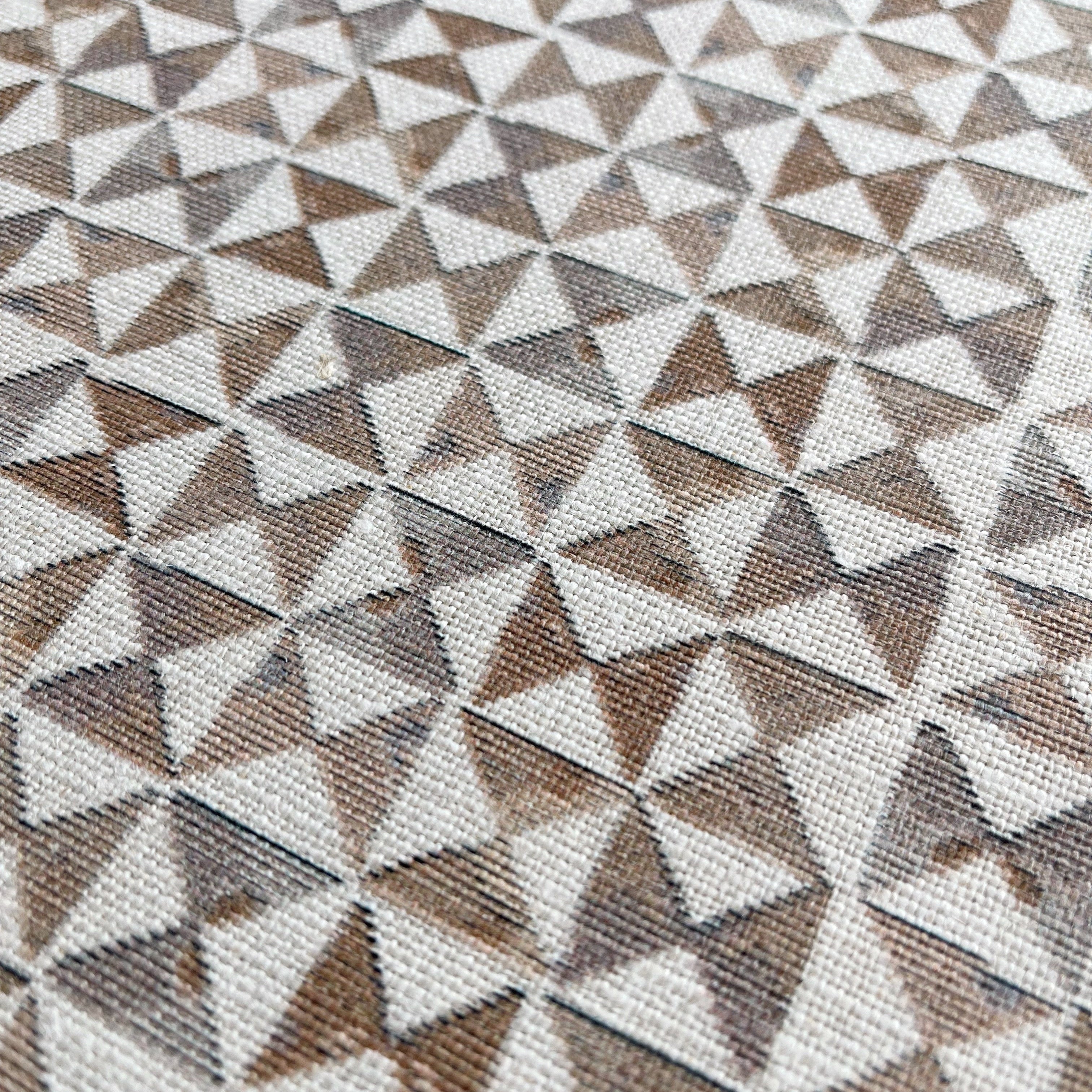 Kaleidoscope fabric in Copper by Emily Daws — close-up detail of Belgian linen, Fauna Collection