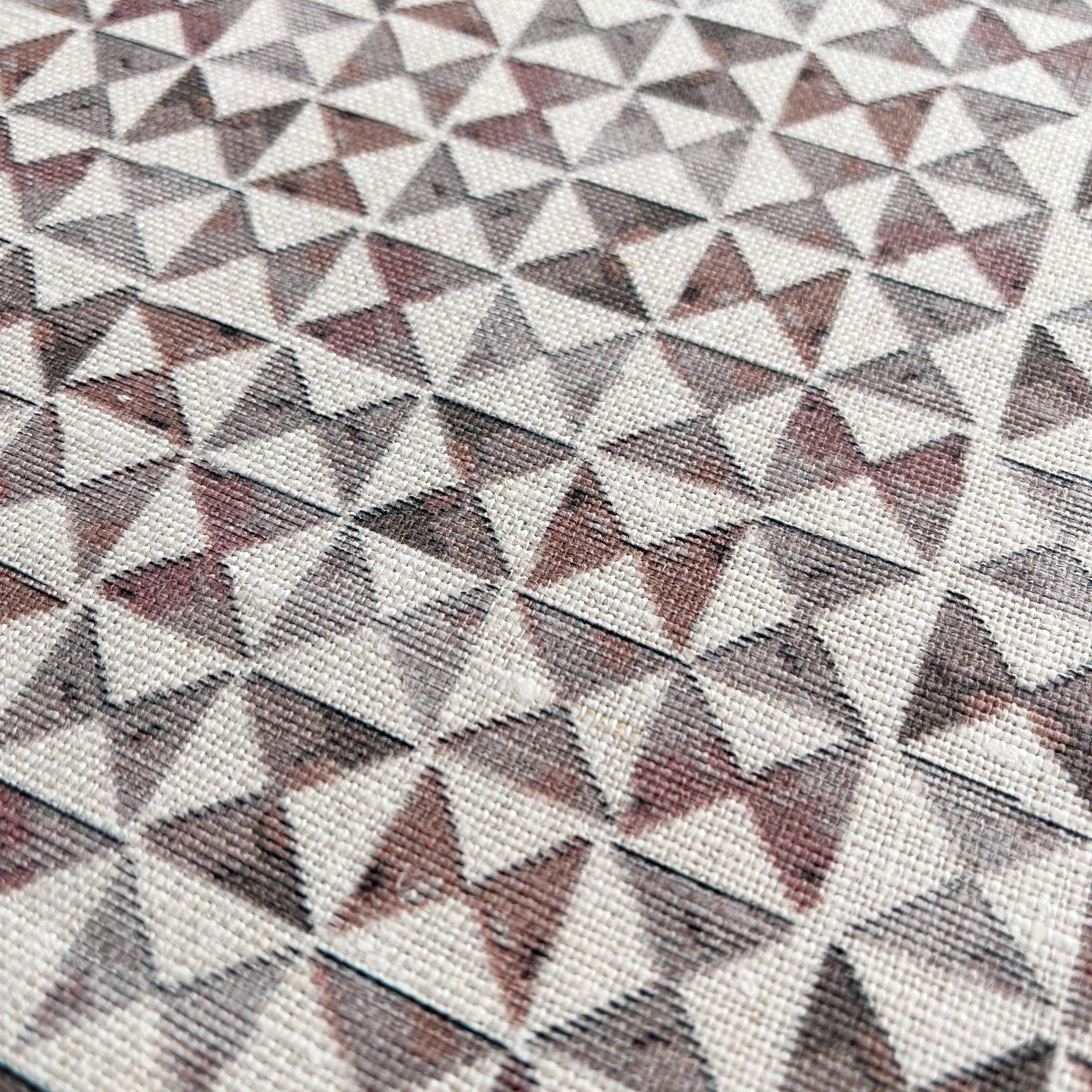 Kaleidoscope pillow in Cranberry β close-up of natural linen and pattern from the Fauna Collection