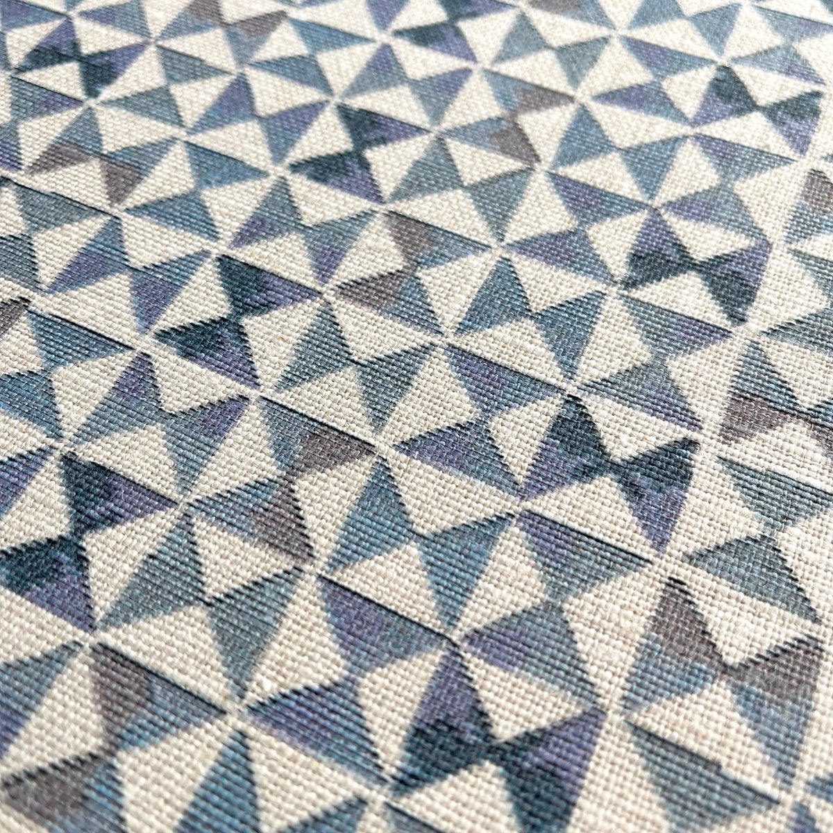 Kaleidoscope fabric in Iris by Emily Daws — close-up detail of Belgian linen, Fauna Collection