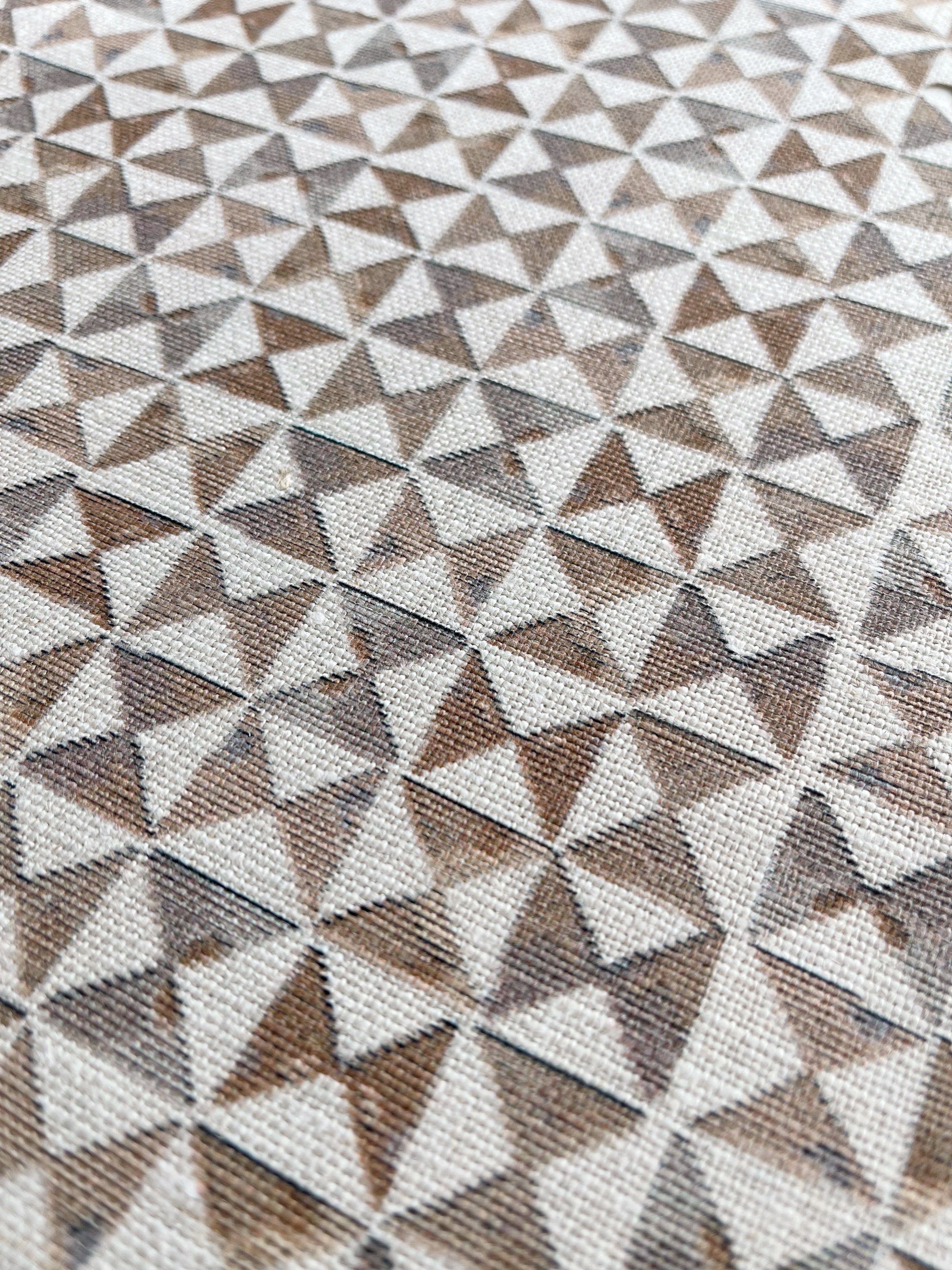 Kaleidoscope pillow in Copper – close-up of natural linen and pattern from the Fauna Collection