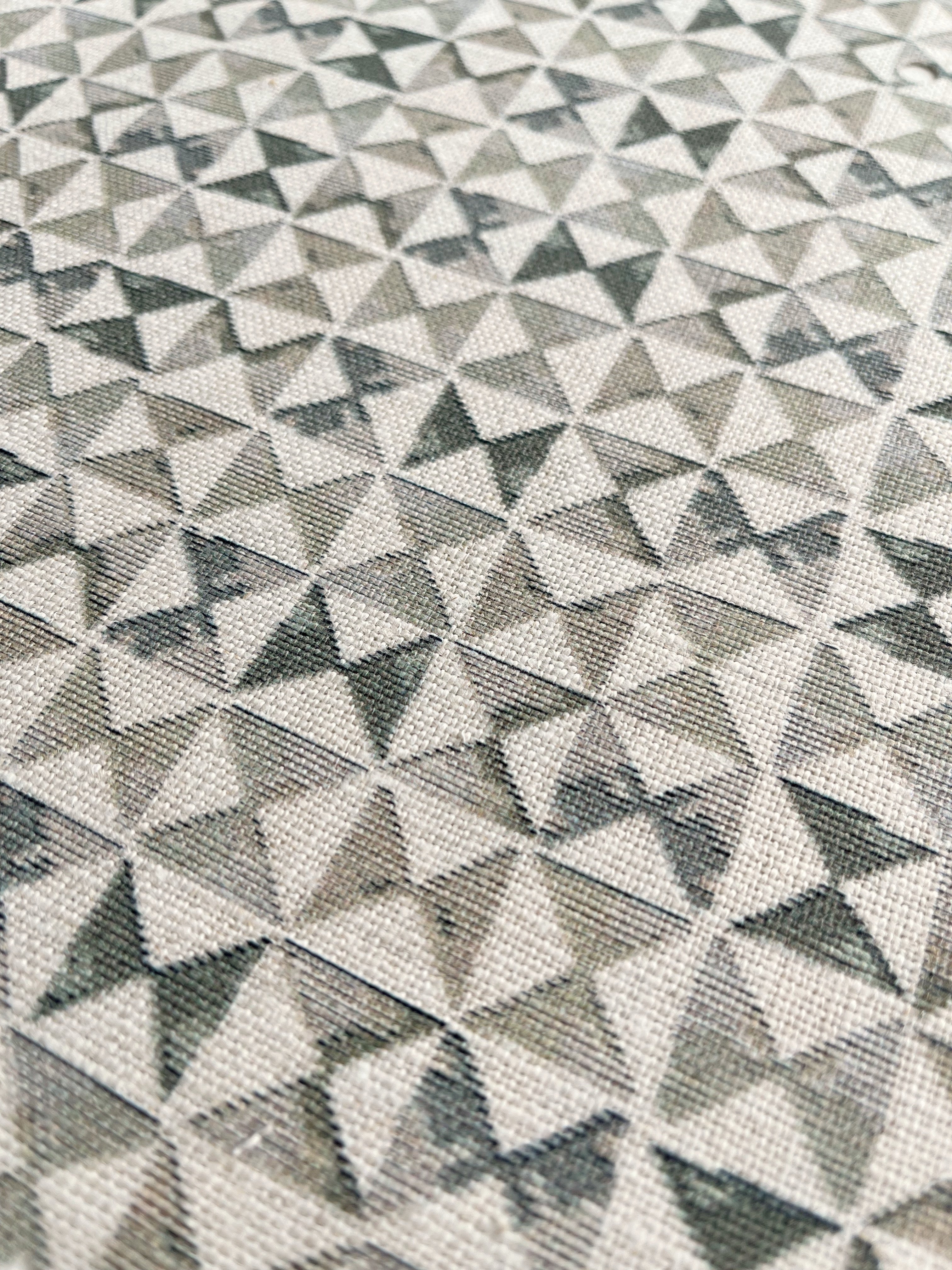 Kaleidoscope pillow in Ivy – close-up of natural linen and pattern from the Fauna Collection