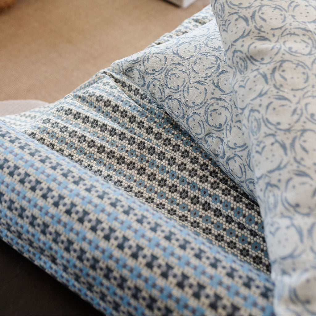 Nectar fabric in Cerulean Blue styled by Emily Daws – nature-inspired textile for cabin or mountain homes