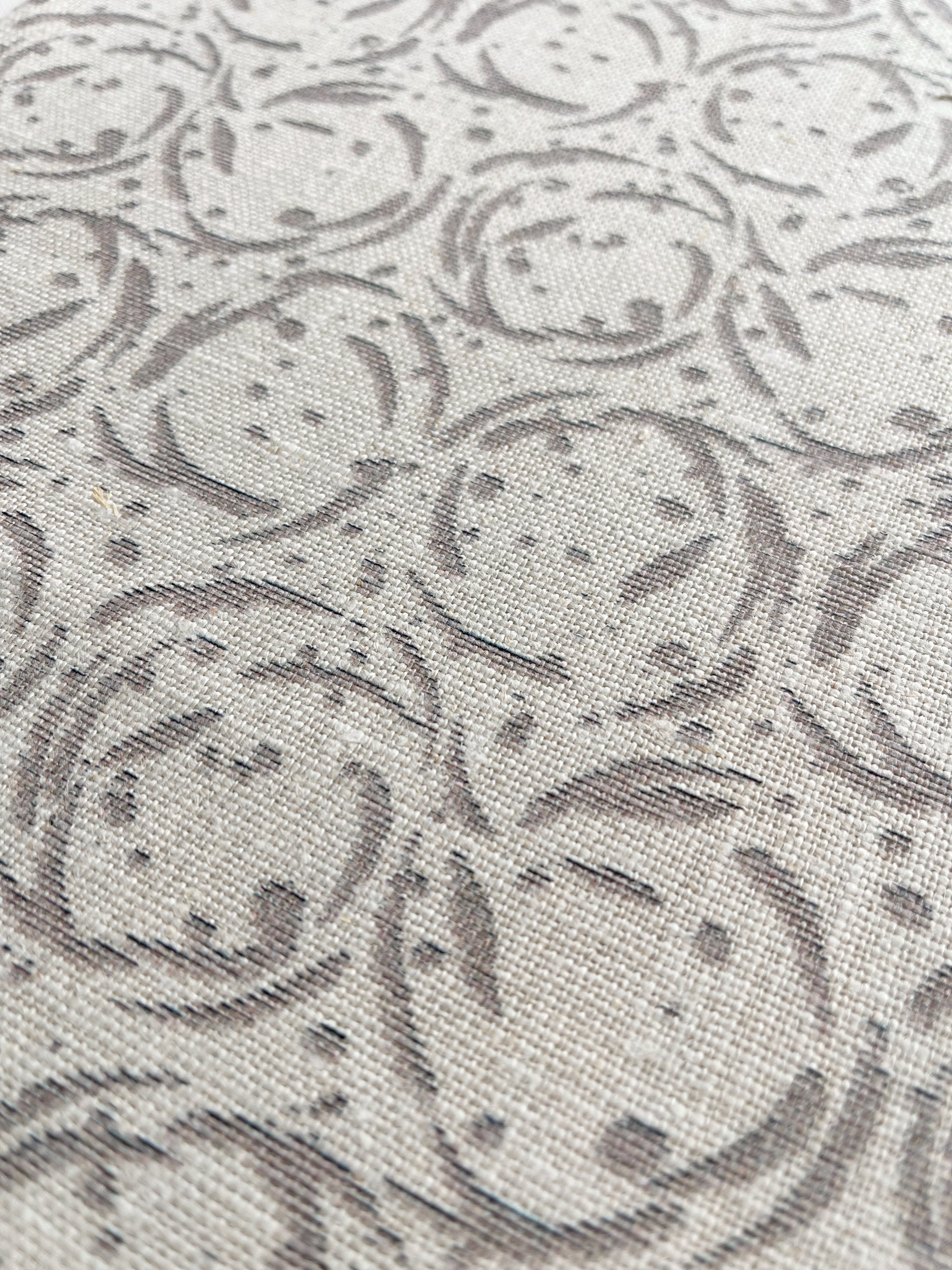 Nest pillow in Nutmeg – close-up of natural linen and pattern from the Fauna Collection