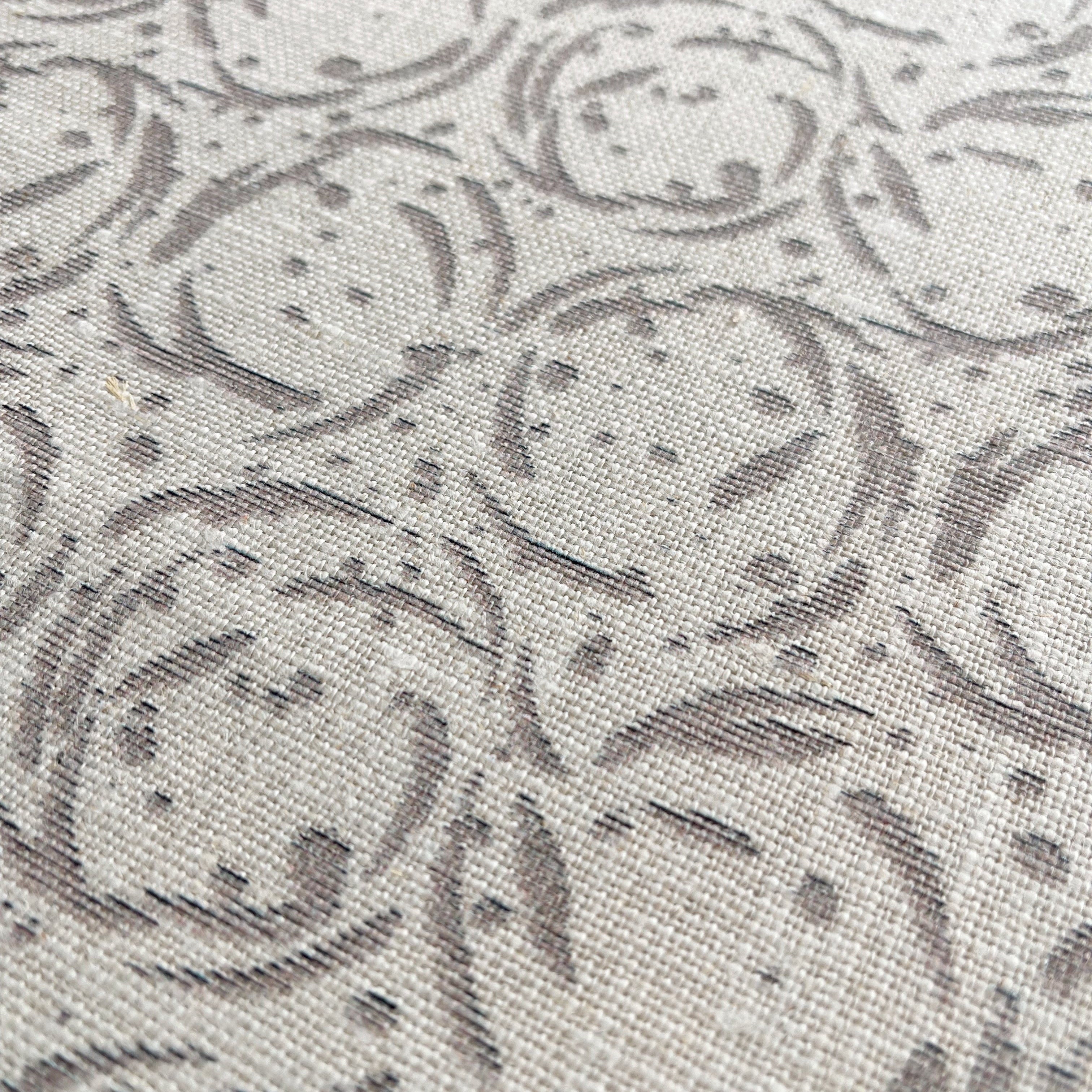 Nest pillow in Nutmeg β close-up of natural linen and pattern from the Fauna Collection