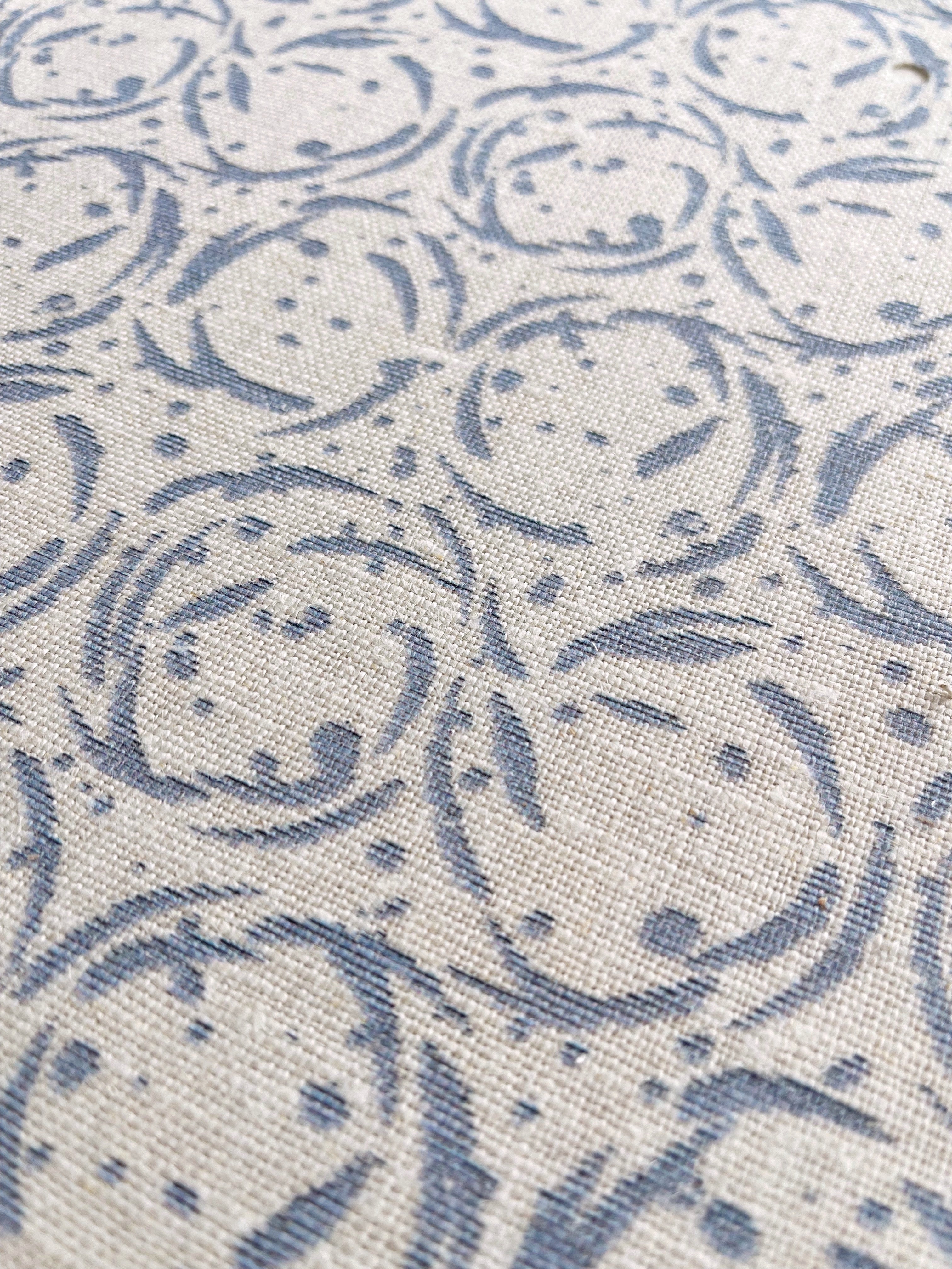 Nest pillow in Raindrop – close-up of natural linen and pattern from the Fauna Collection