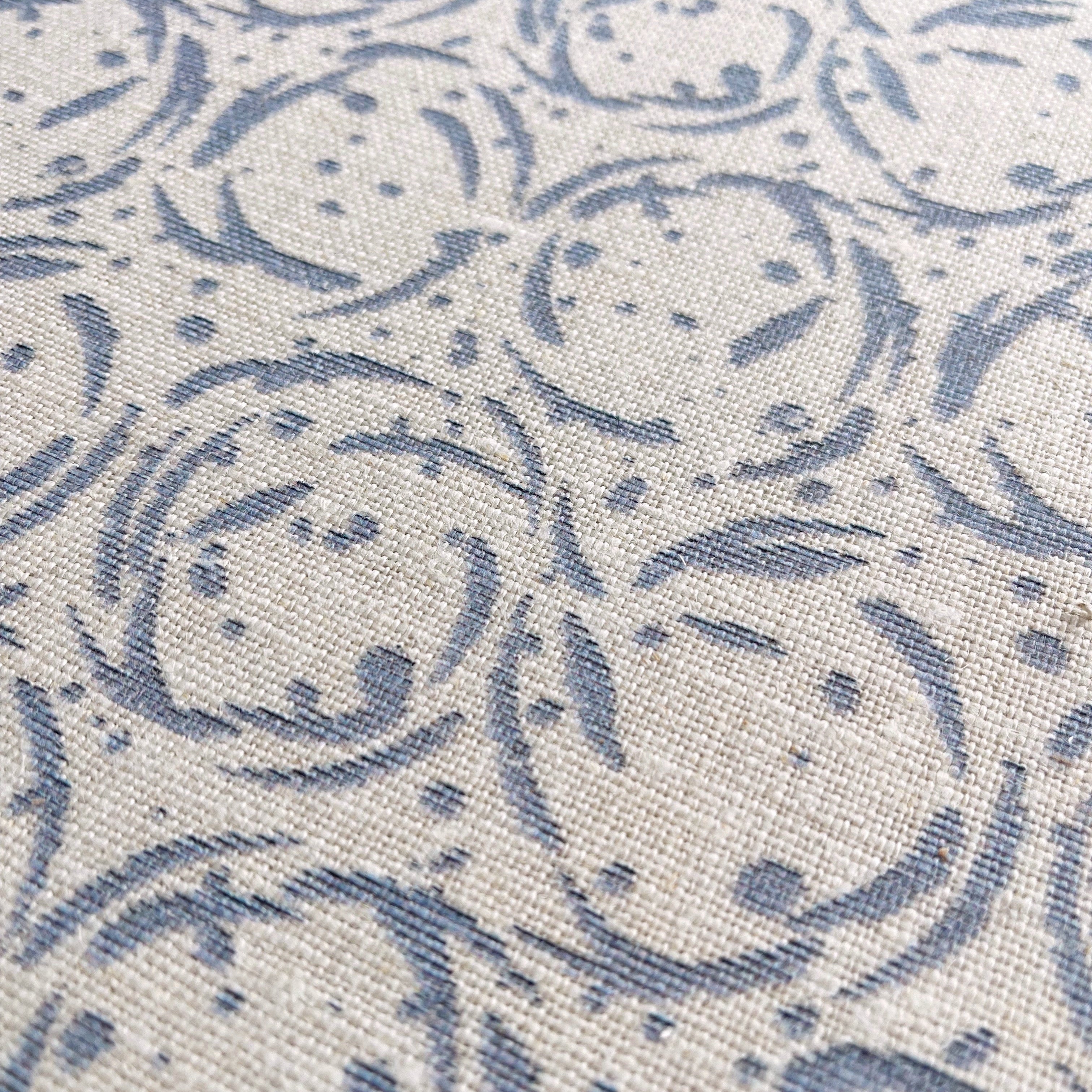 Nest pillow in Raindrop – close-up of natural linen and pattern from the Fauna Collection