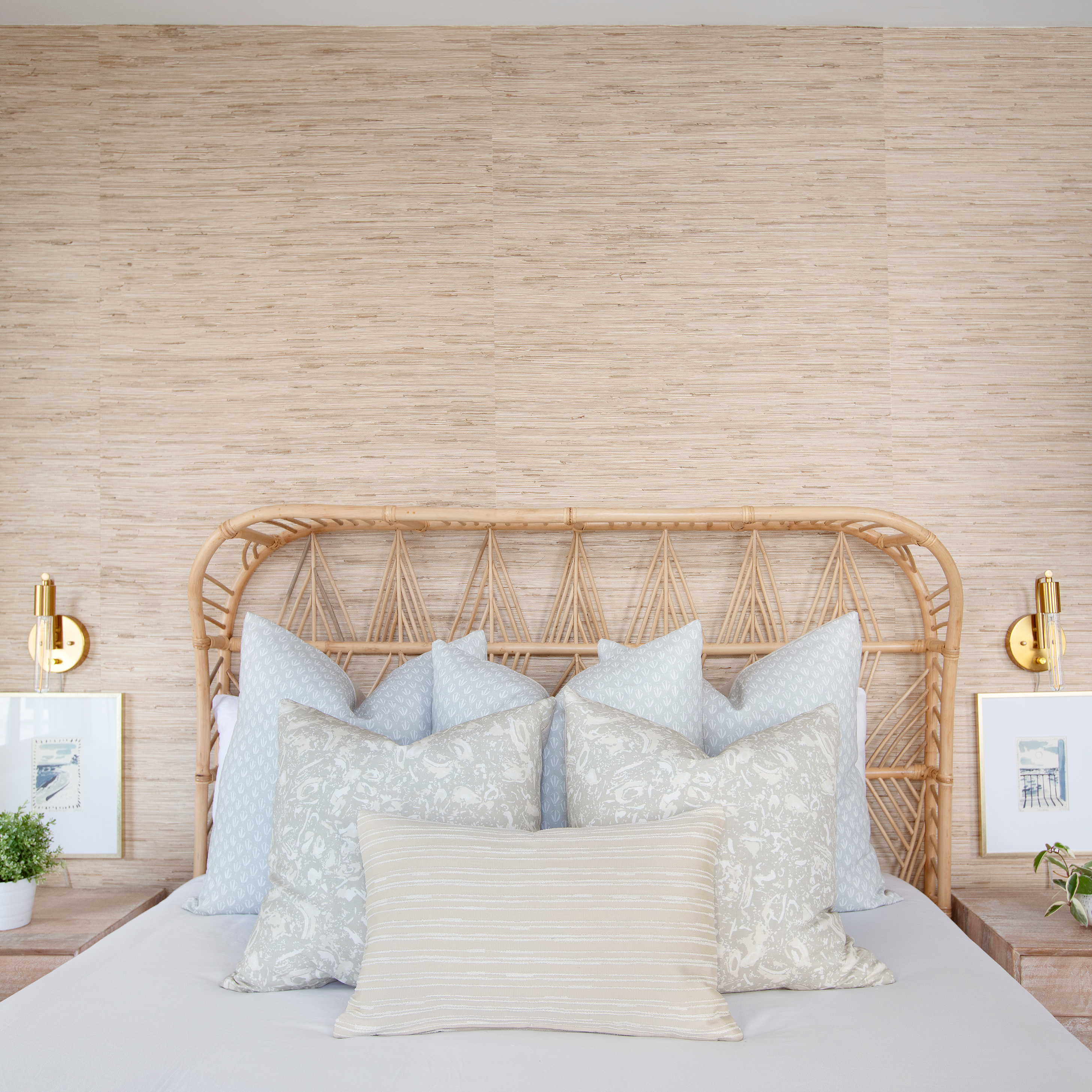 River Reef pillow in Marble styled by Emily Daws – shown on a porch bench with other woven accents