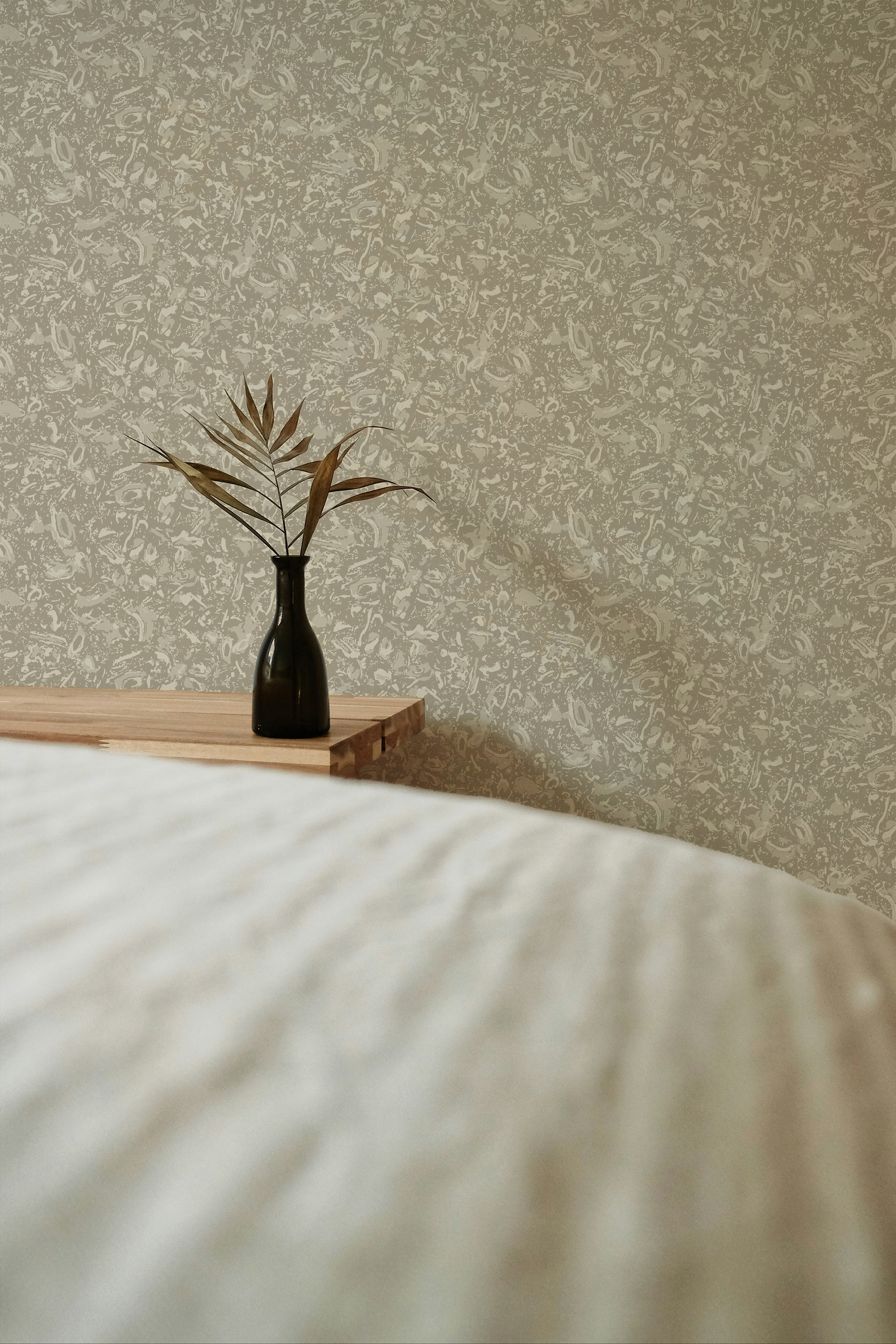 River Reef wallpaper in Natural styled by Emily Daws – beach house bedroom with layered textures
