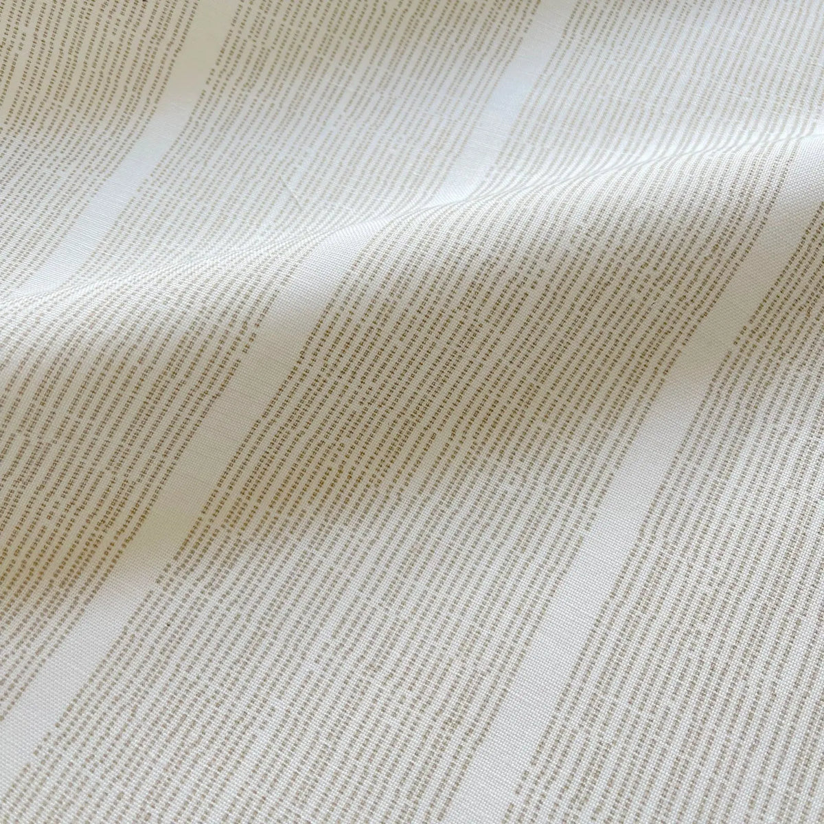 Sandbar Tawny pillow by Emily Daws styled in an interior — Waterways Collection