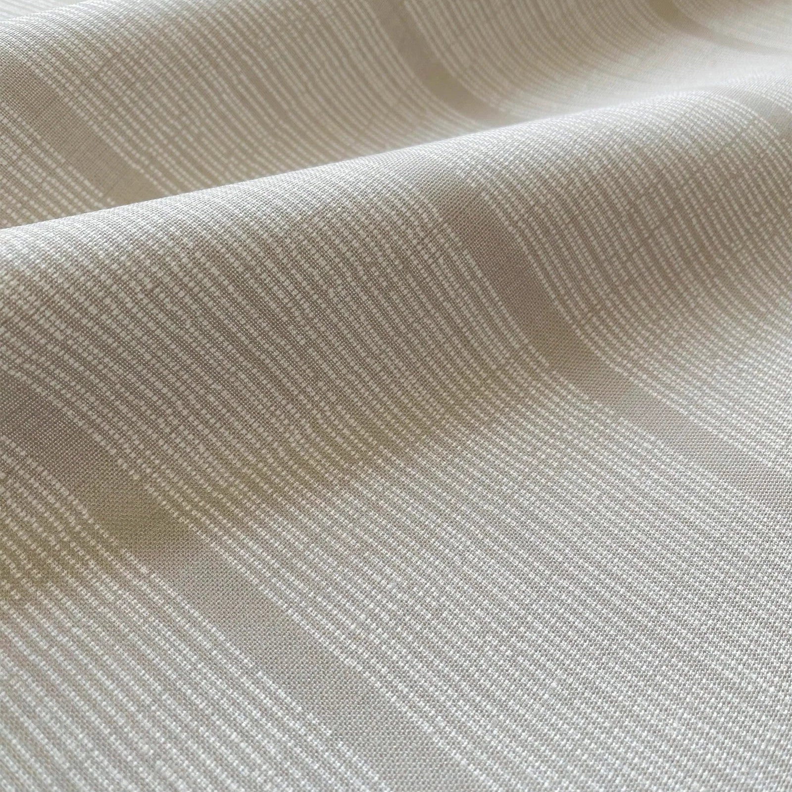 Sandbar pillow in Teak – close-up of fabric texture and linear pattern from the Waterways Collection
