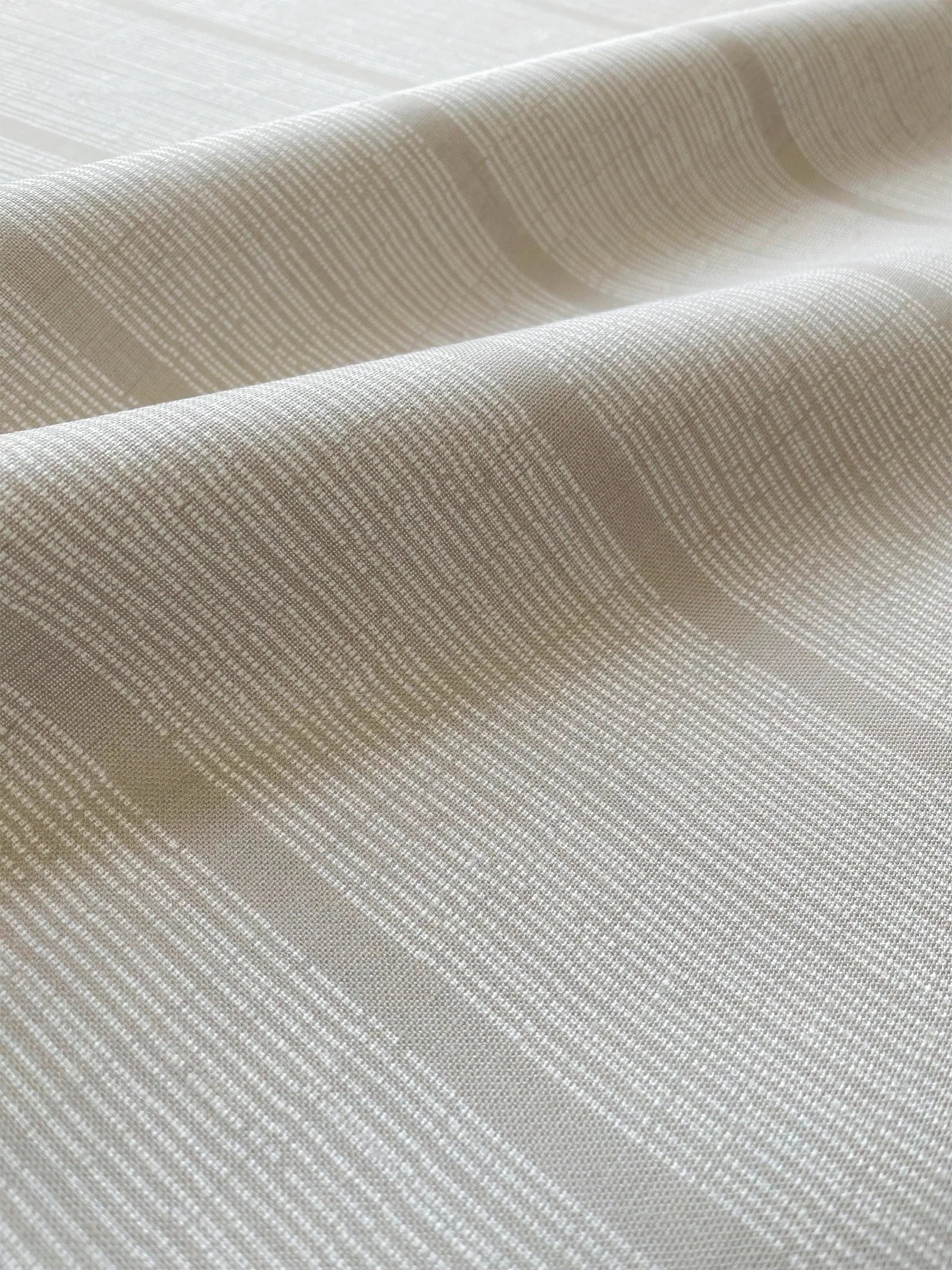 Sandbar pillow in Teak – close-up of fabric texture and linear pattern from the Waterways Collection