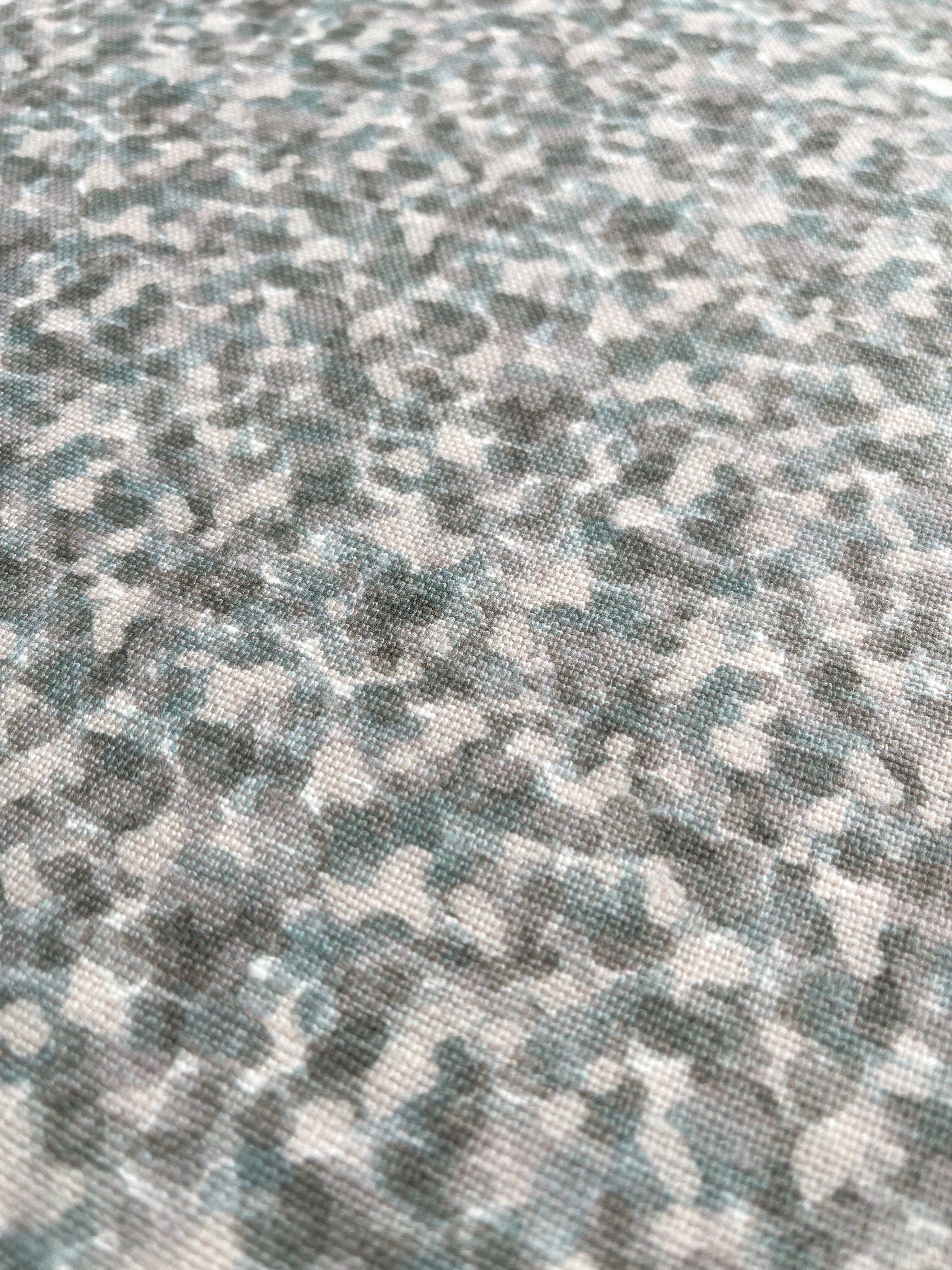 Tortoise pillow in Fig – close-up of natural linen and pattern from the Fauna Collection