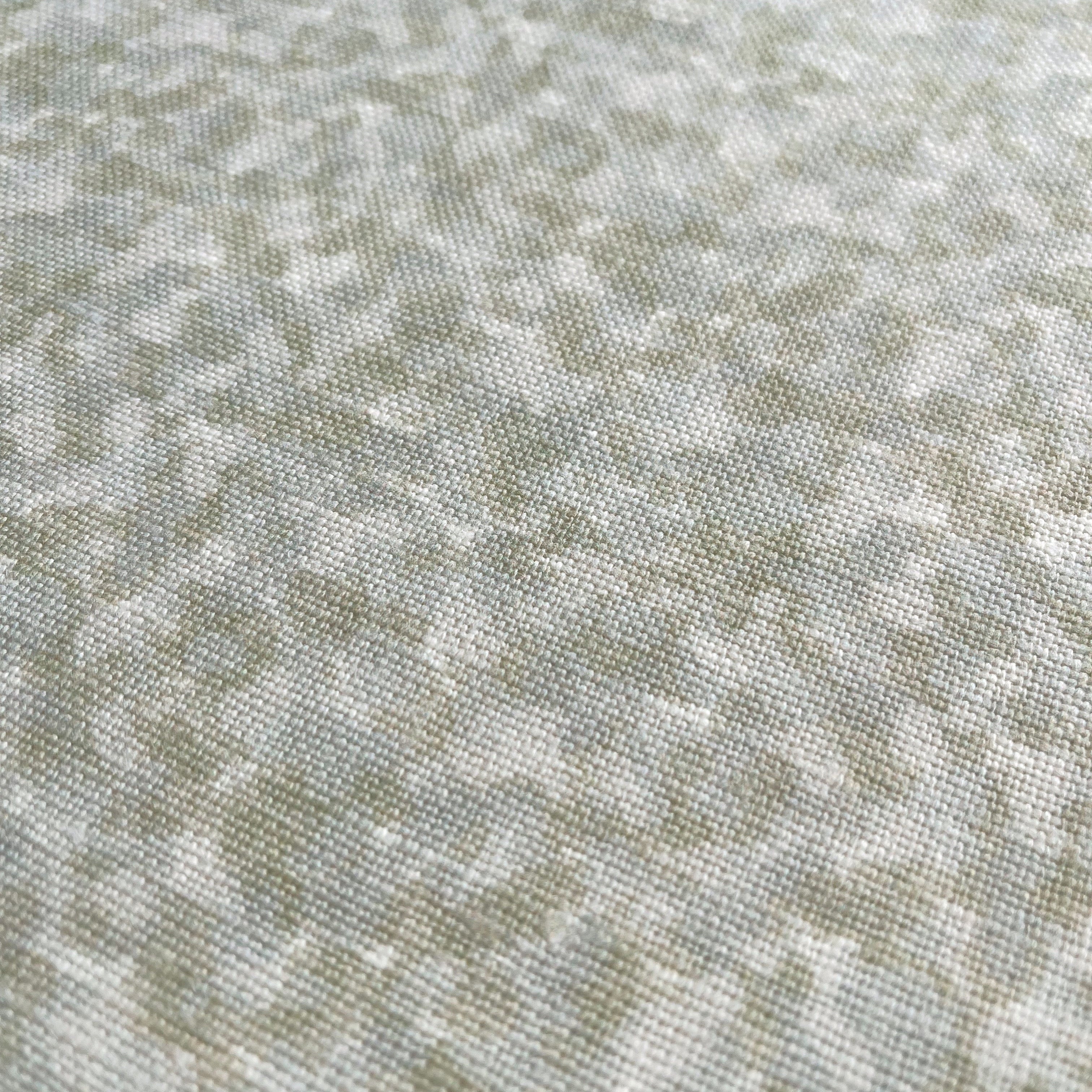 Tortoise fabric in Honeydew by Emily Daws — close-up detail of Belgian linen, Fauna Collection