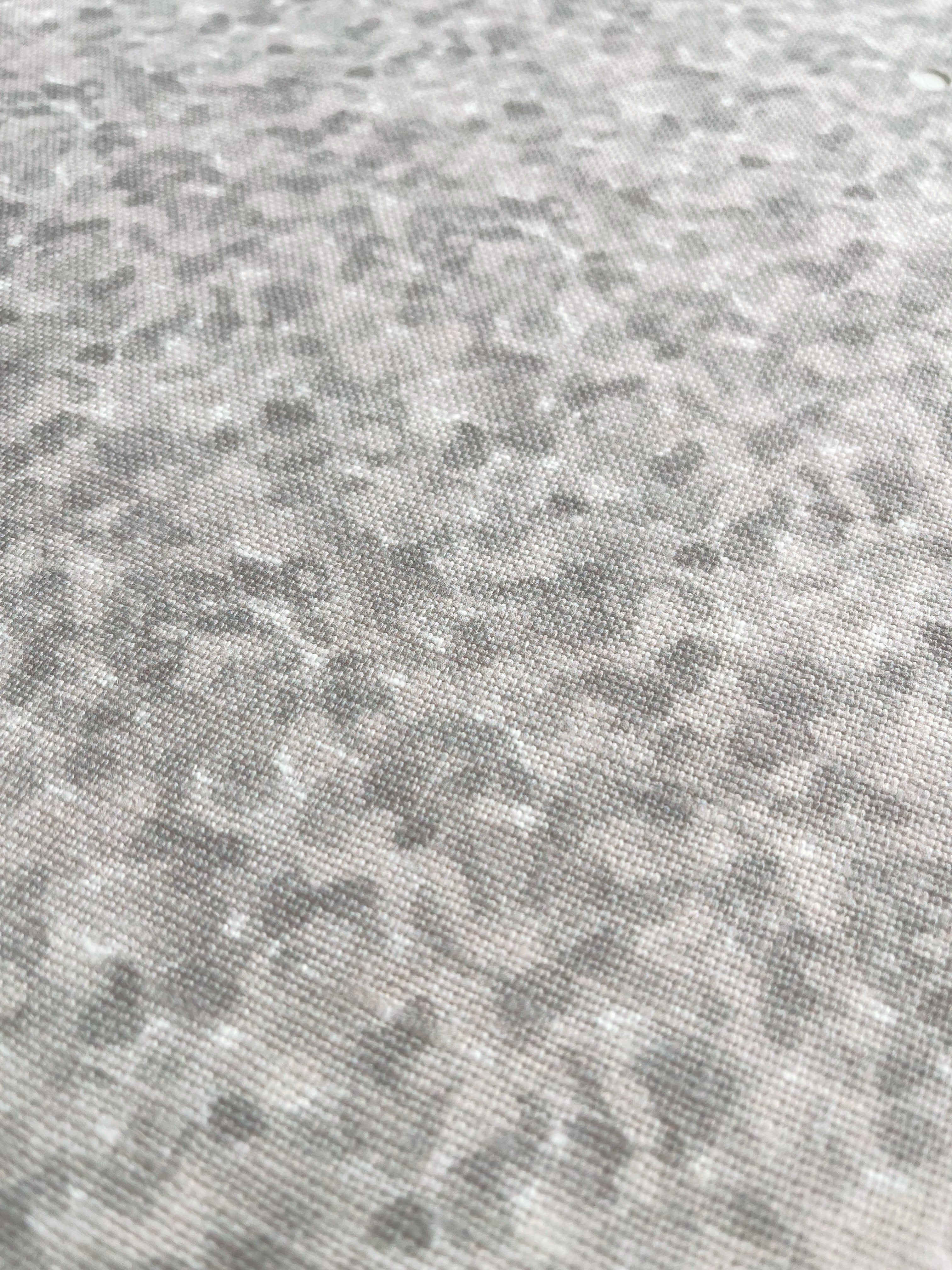 Tortoise pillow in Morel – close-up of natural linen and pattern from the Fauna Collection