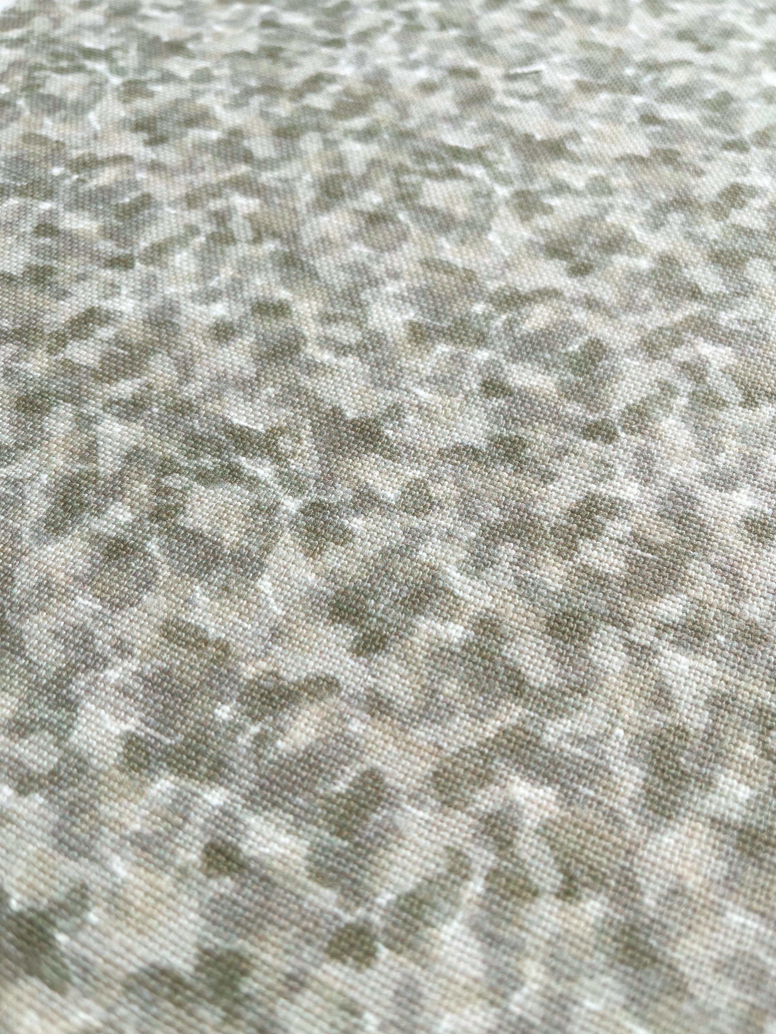 Tortoise pillow in Thyme – close-up of natural linen and pattern from the Fauna Collection