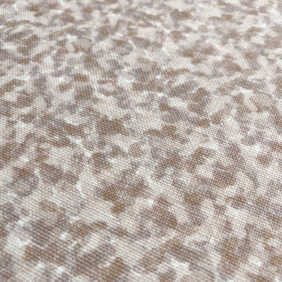 Tortoise fabric in Tulip by Emily Daws — close-up detail of Belgian linen, Fauna Collection