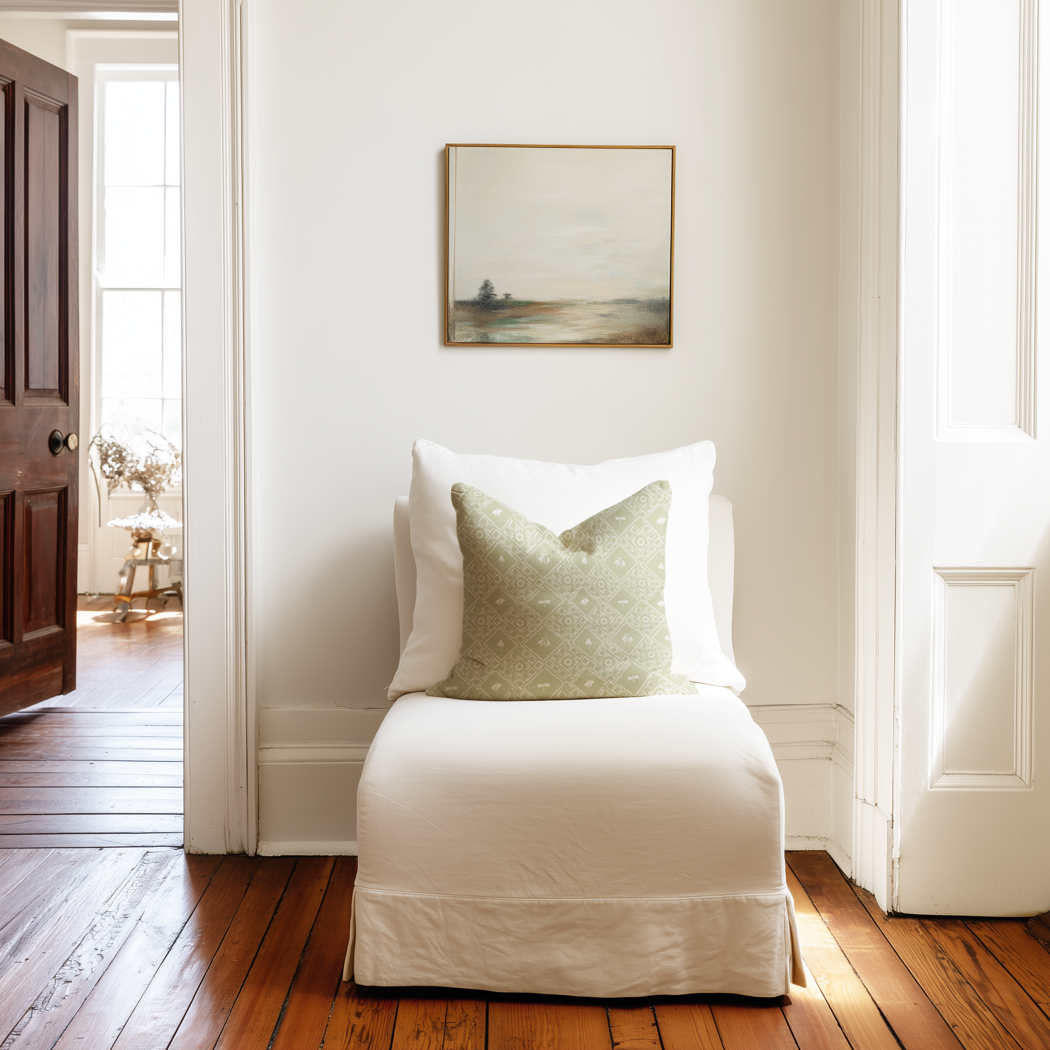 Americana pillow in Edamame styled by Emily Daws – shown on a white chair