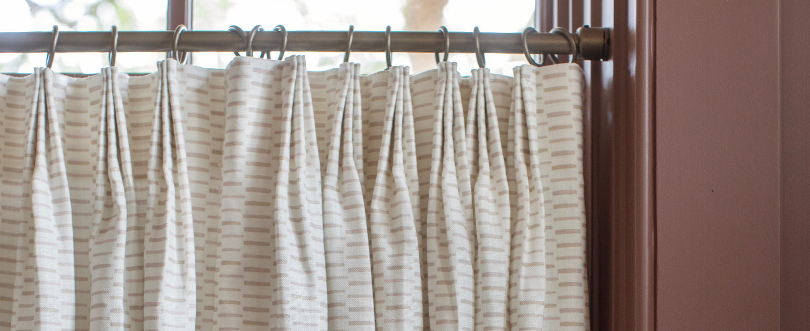 Close up of Emily Daws Drapery panels in Sweetgrass fabric.