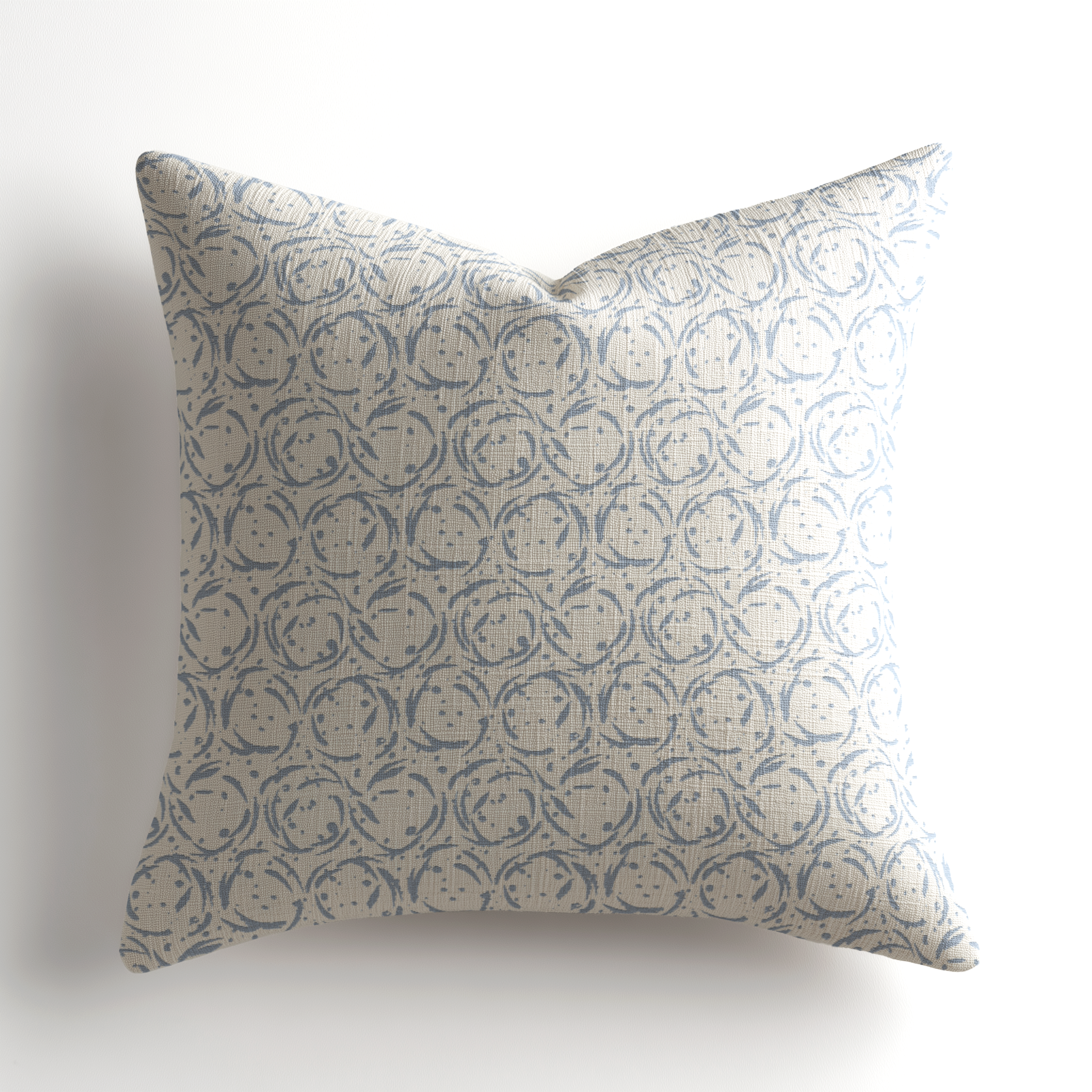 Small-batch handcrafted throw pillow by Emily Daws showcasing the Nest pattern in Raindrop, a Charleston-based artful accent pillow ideal for refined luxury interiors.