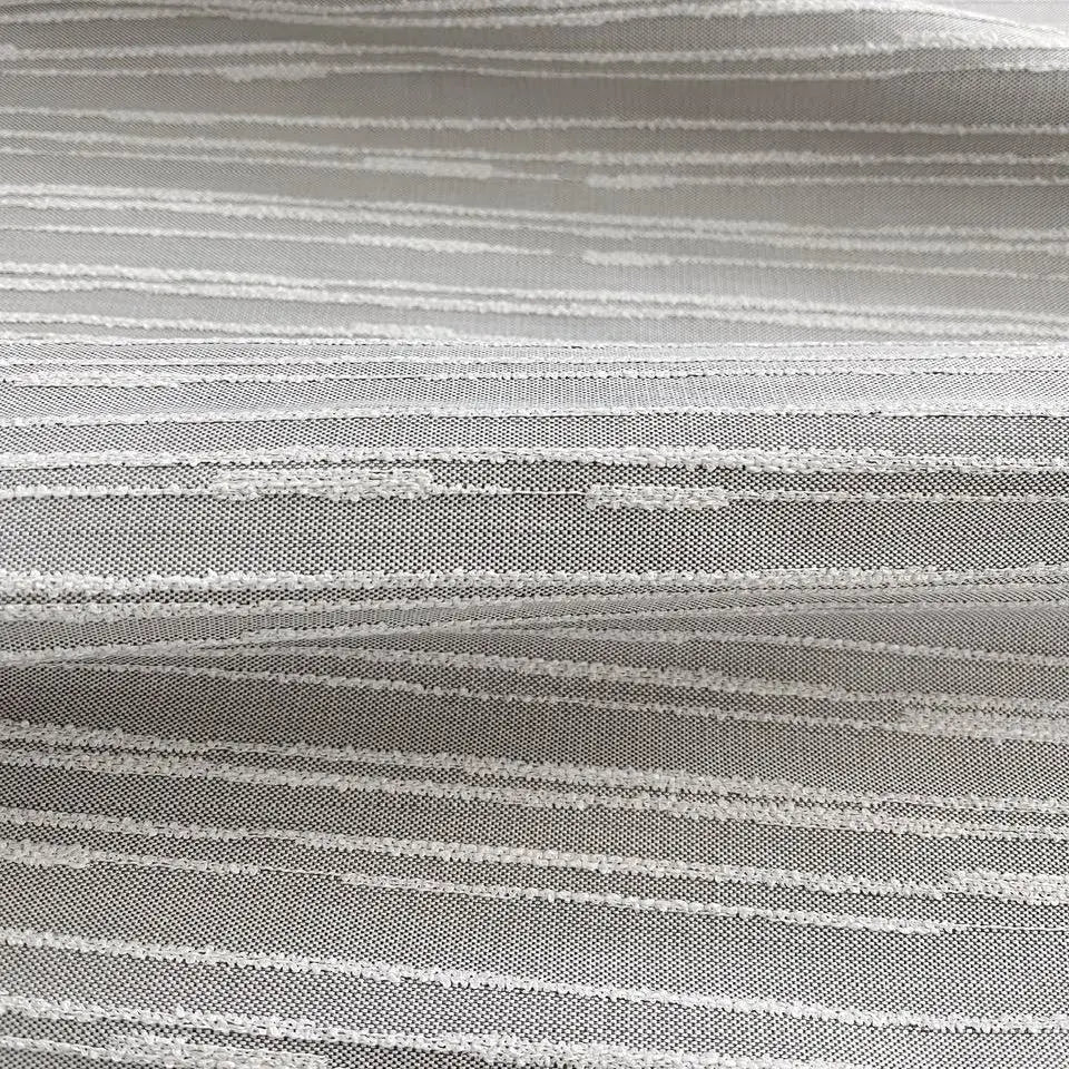 Washout Pebble pillow by Emily Daws styled in an interior — Waterways Collection