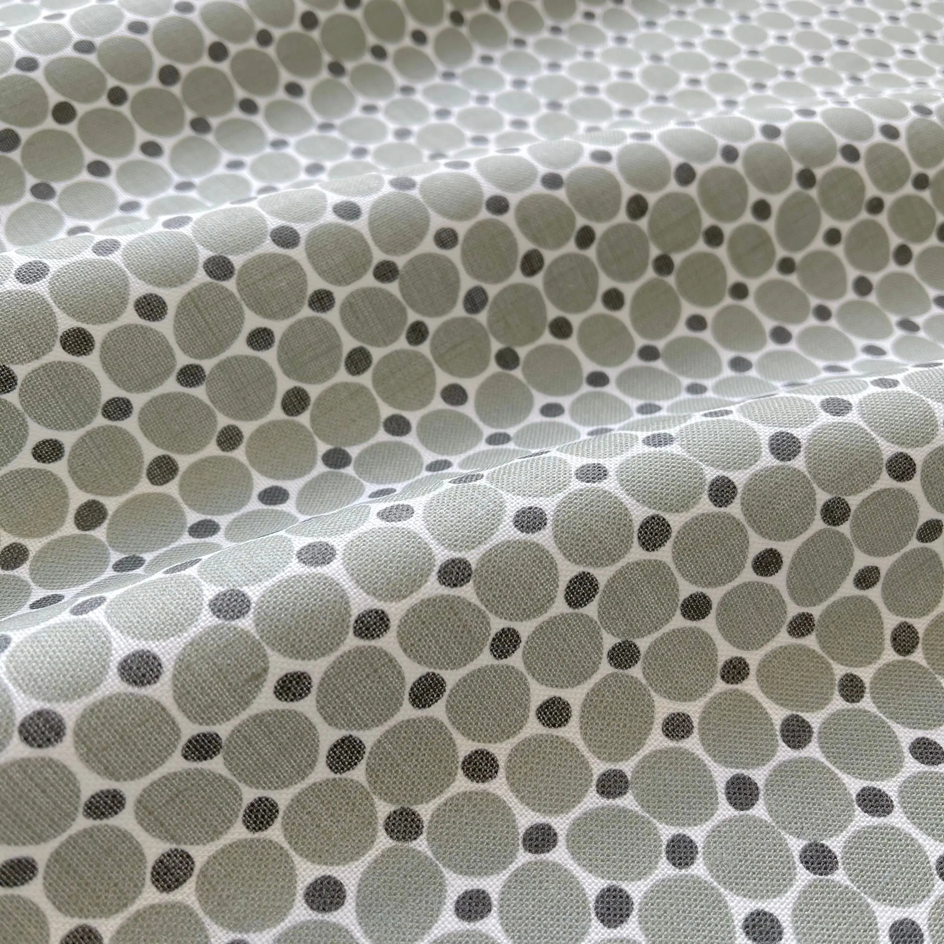 Cobblestone Olive pillow by Emily Daws styled in an interior — Charleston Collection